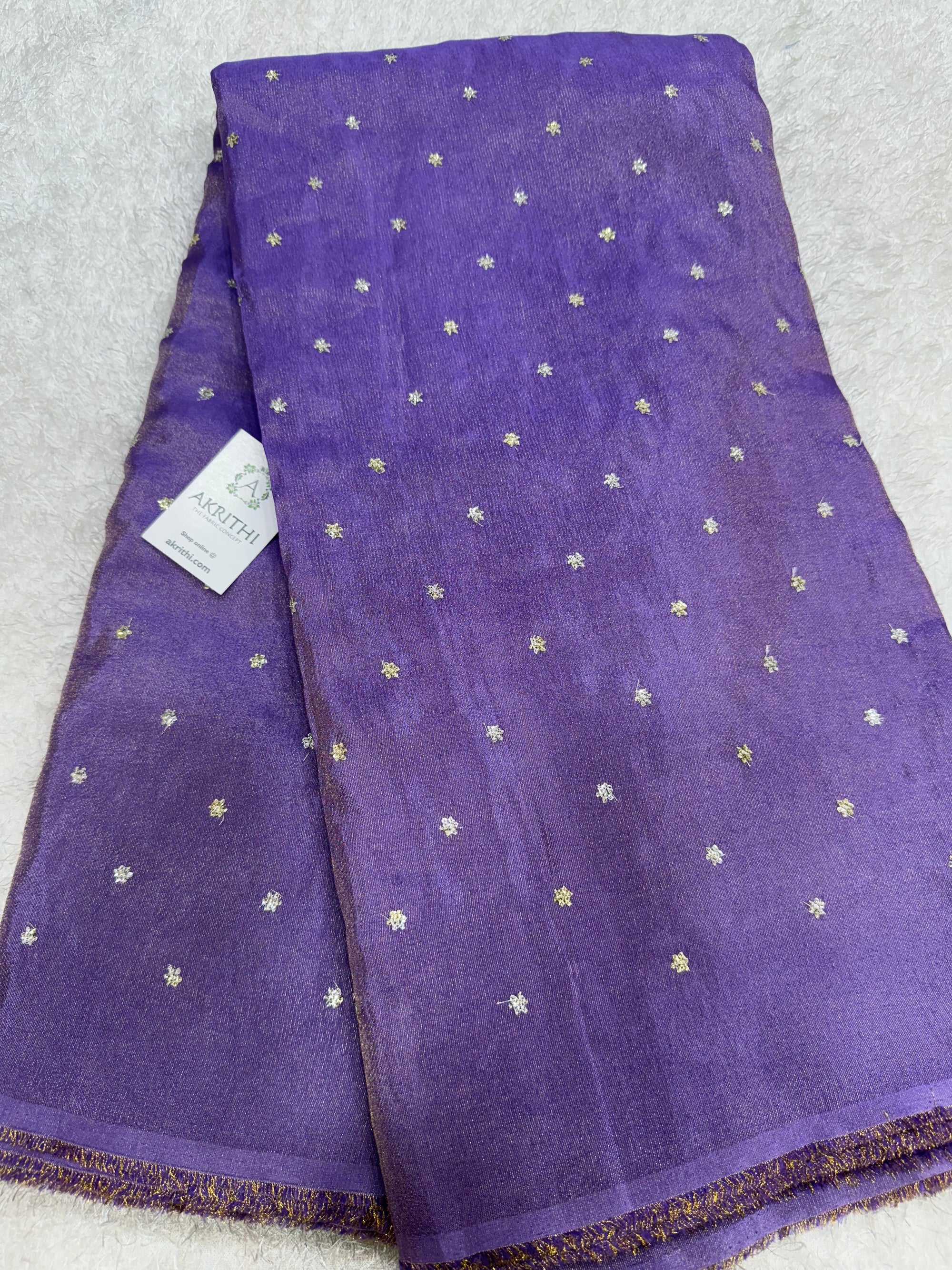 Sequins on tissue fabric