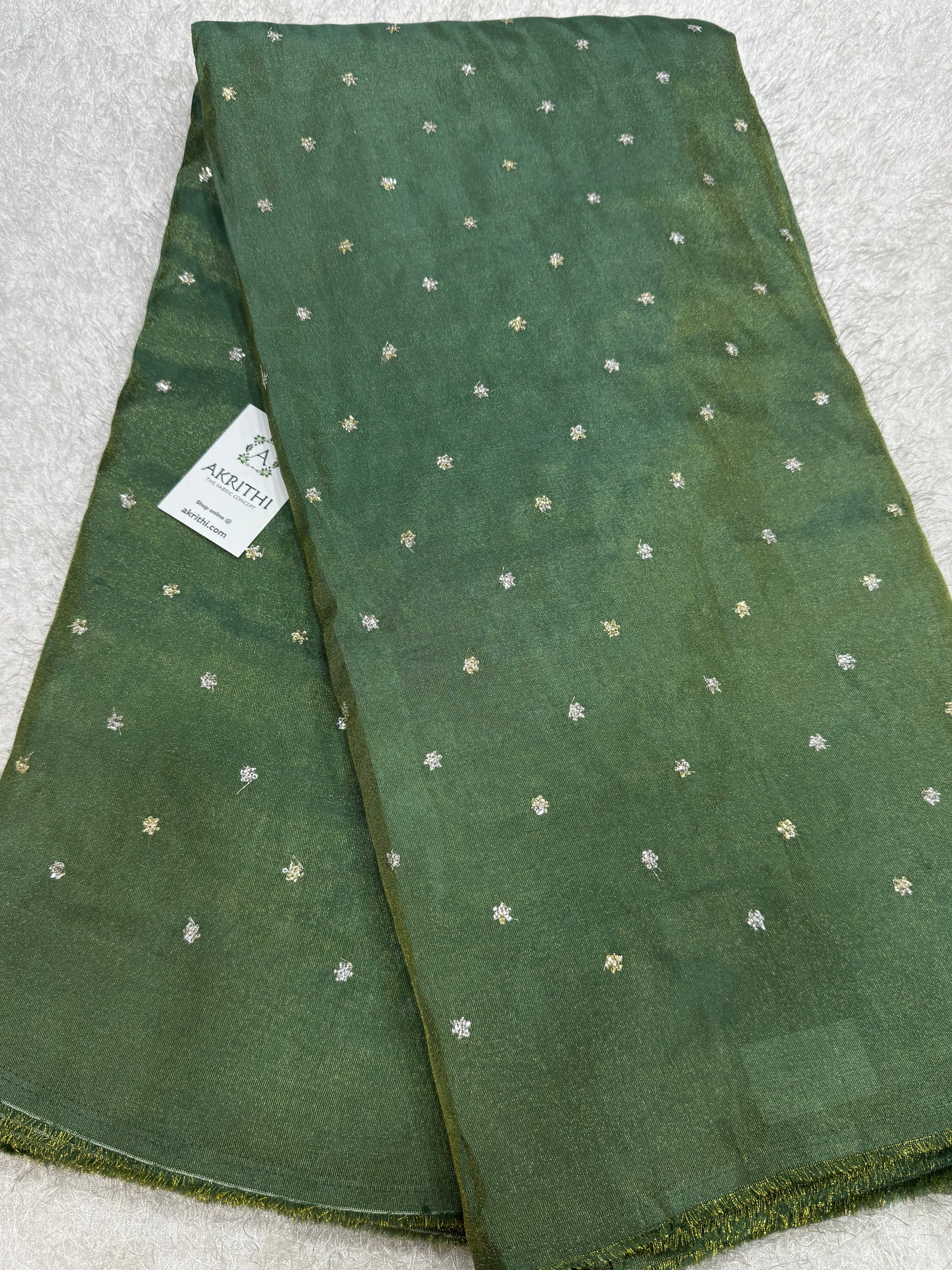 Sequins on tissue fabric
