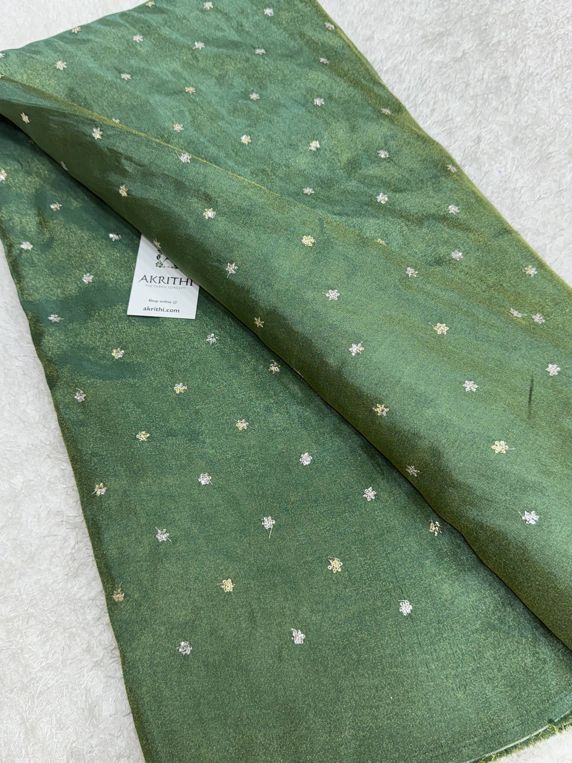Sequins on tissue fabric