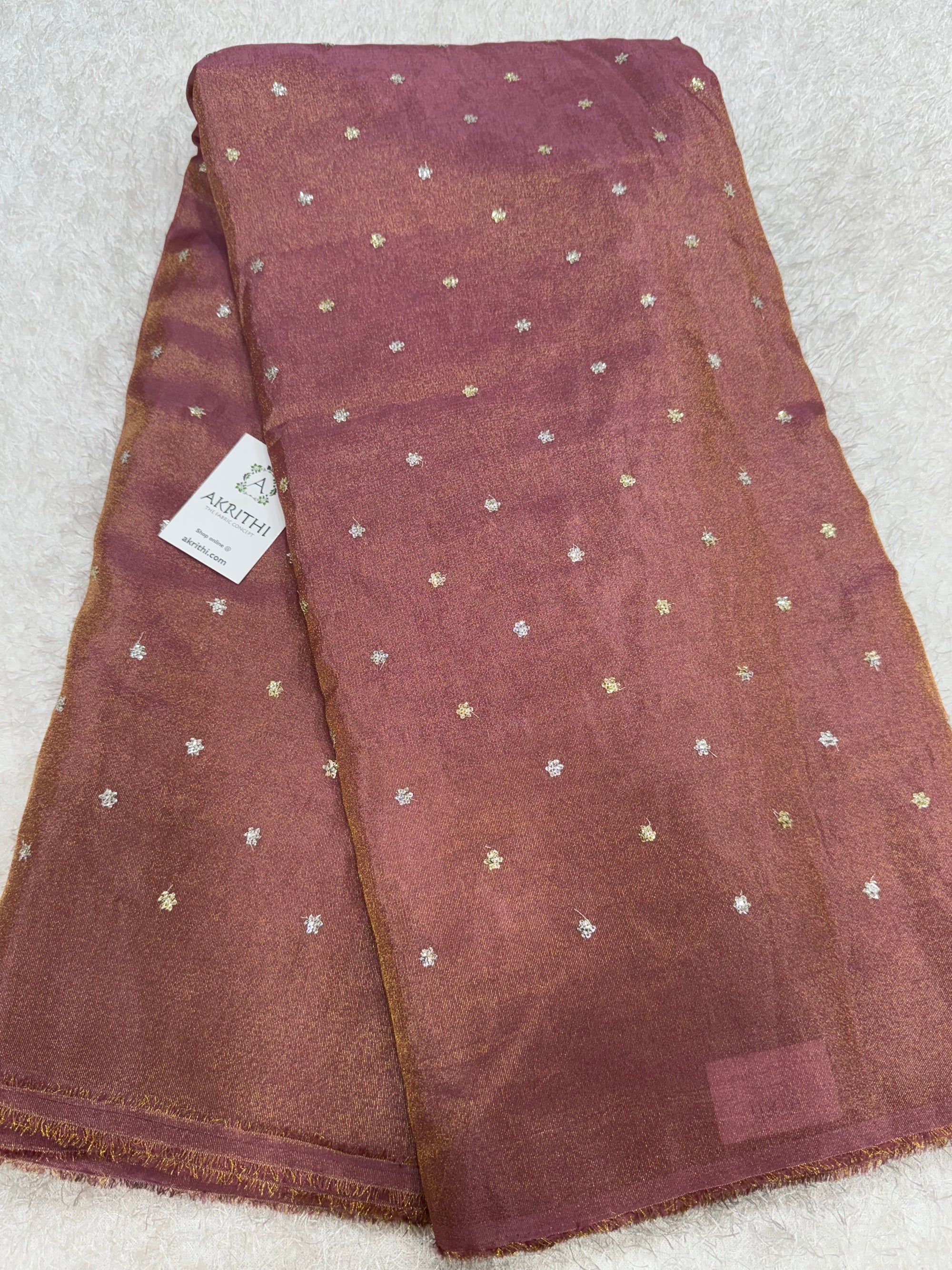 Sequins on tissue fabric