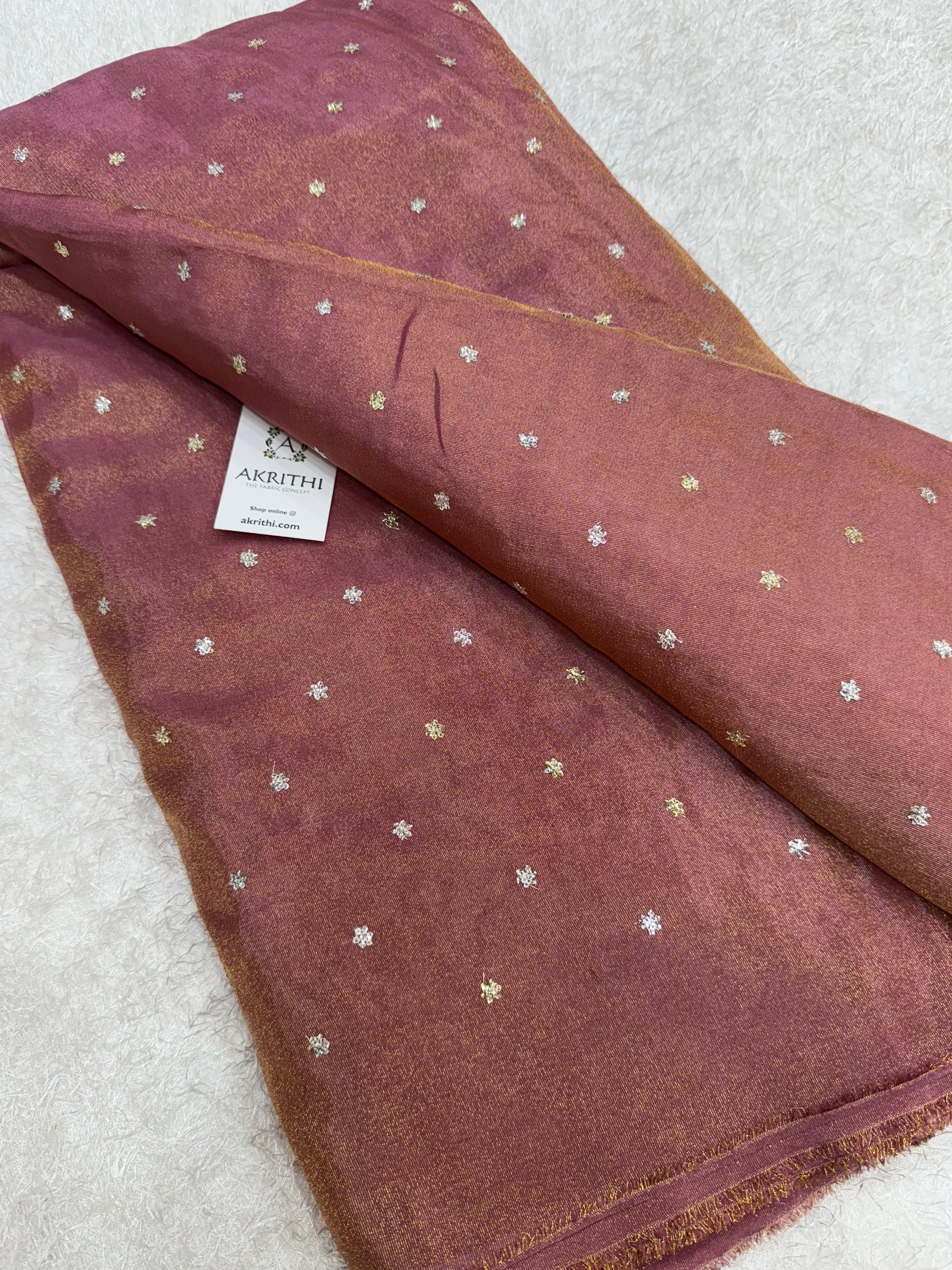 Sequins on tissue fabric