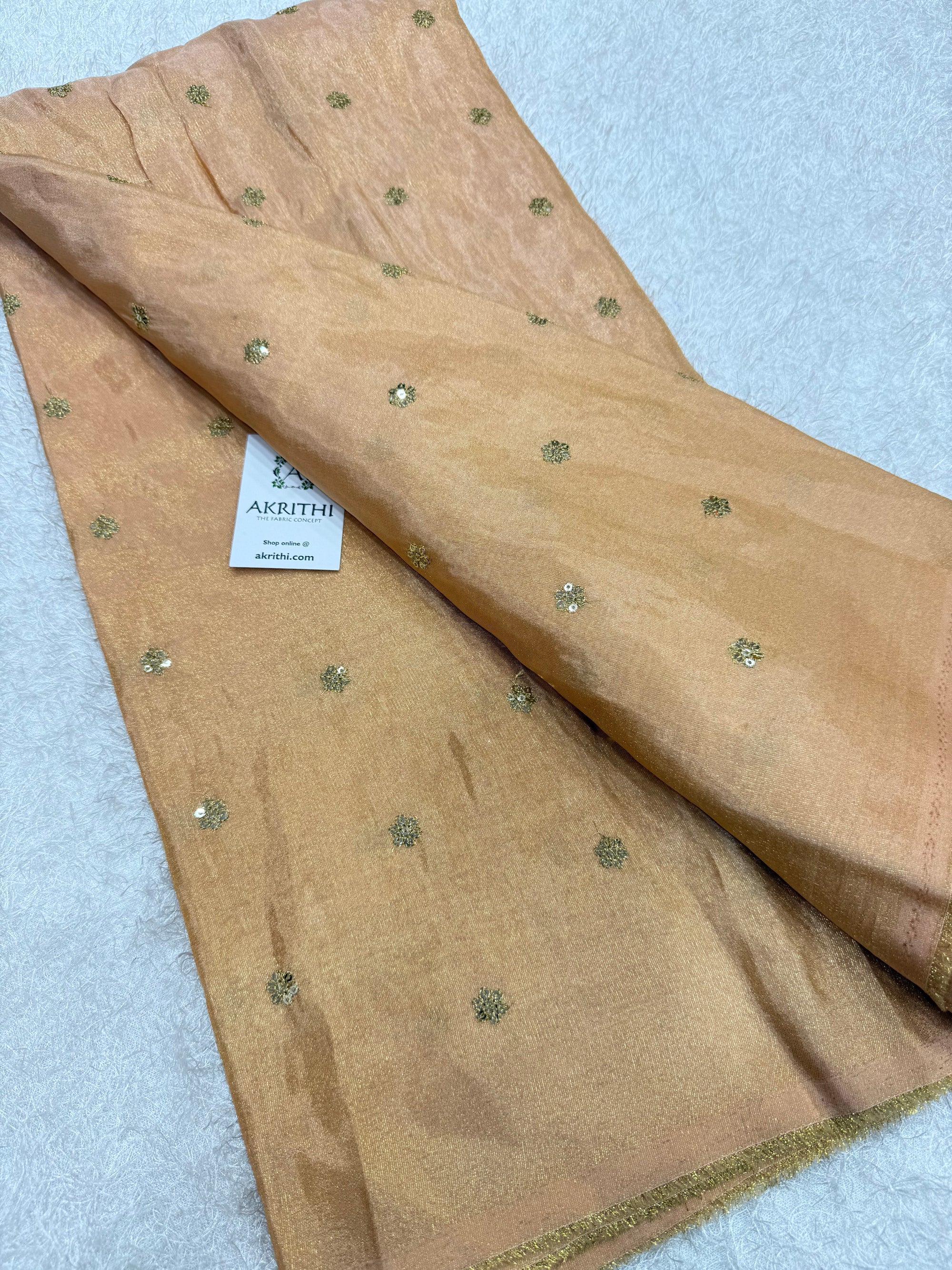 Sequins on tissue fabric