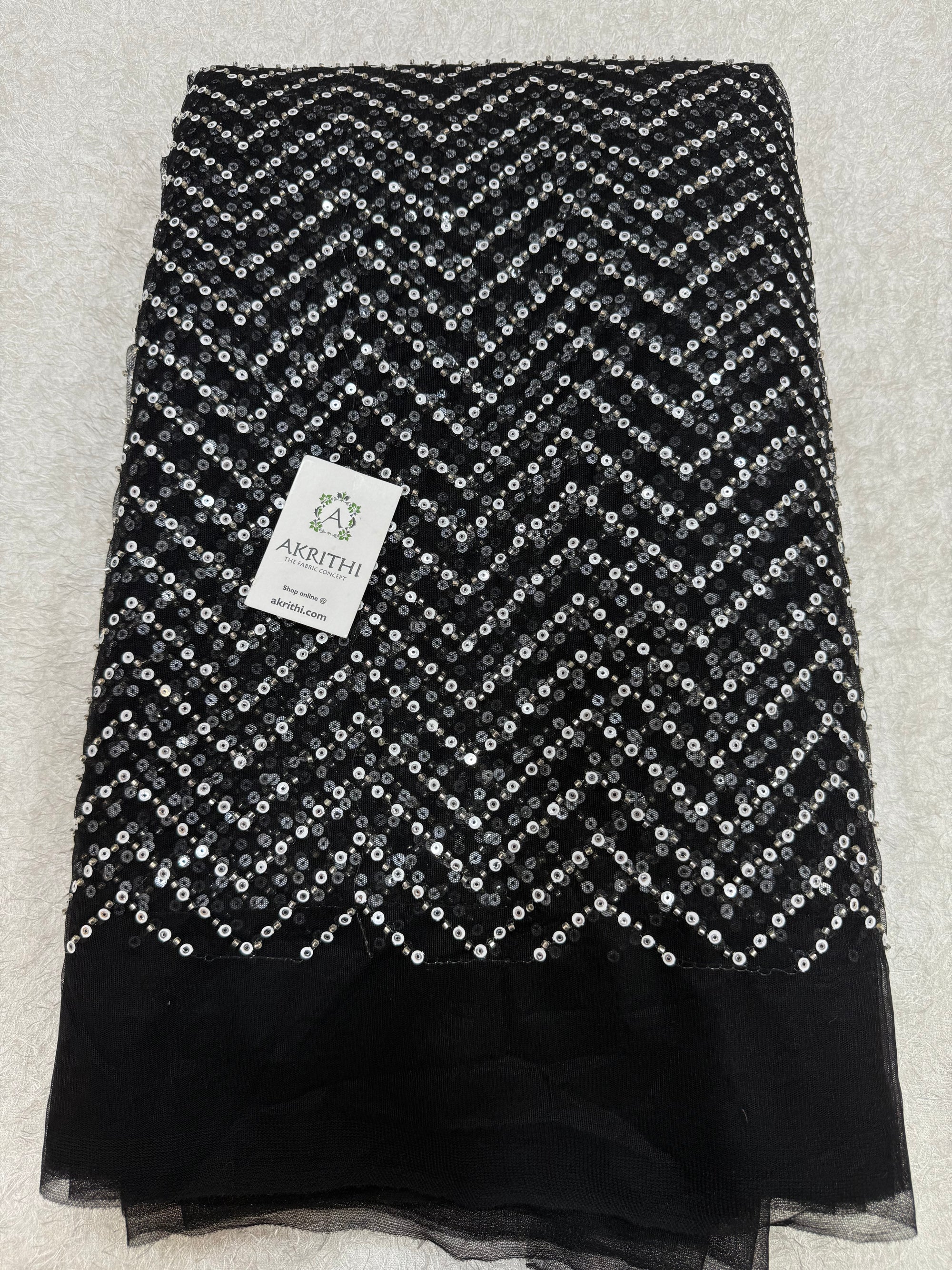 Embroidered net fabric