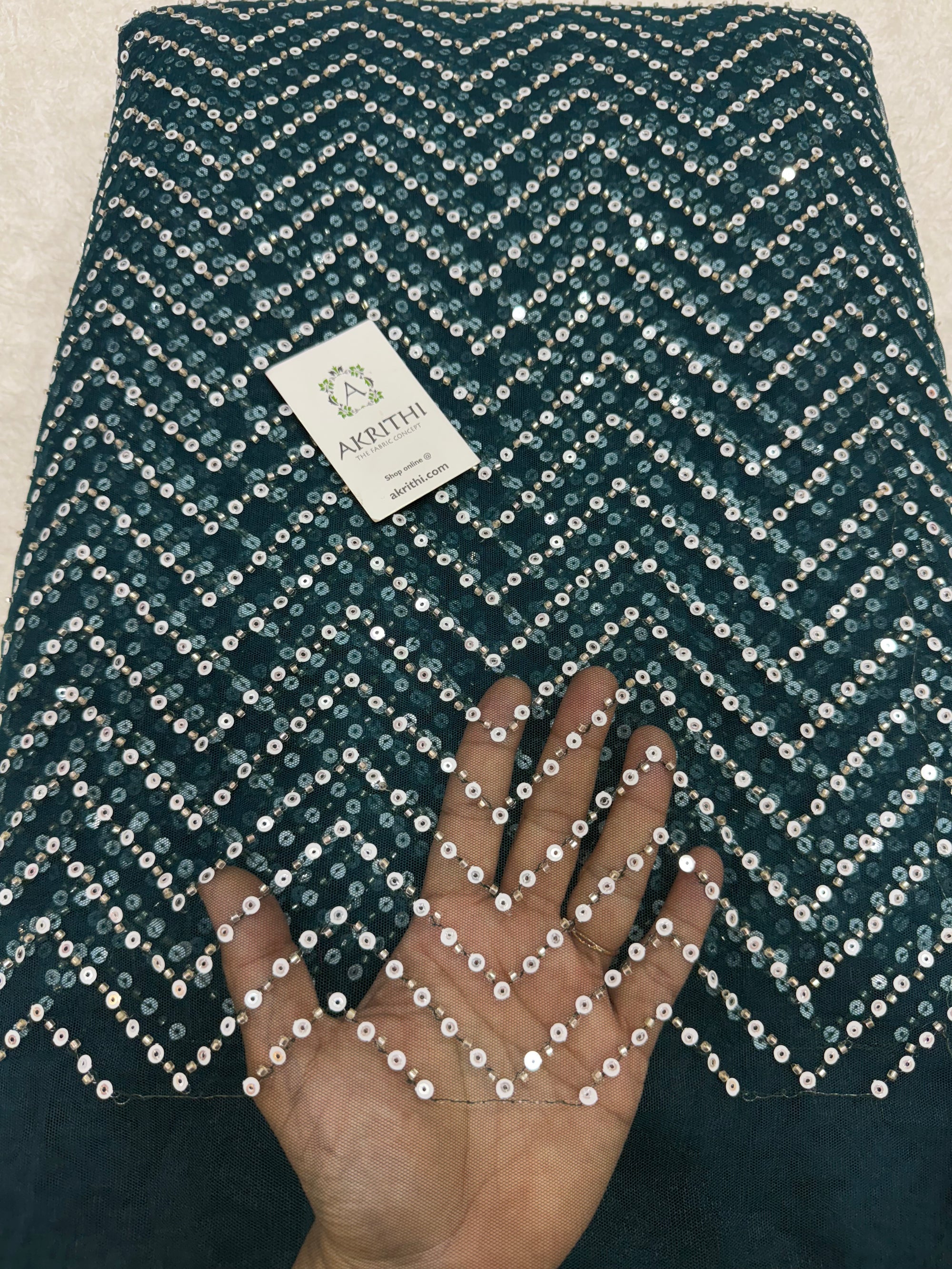 Embroidered net fabric