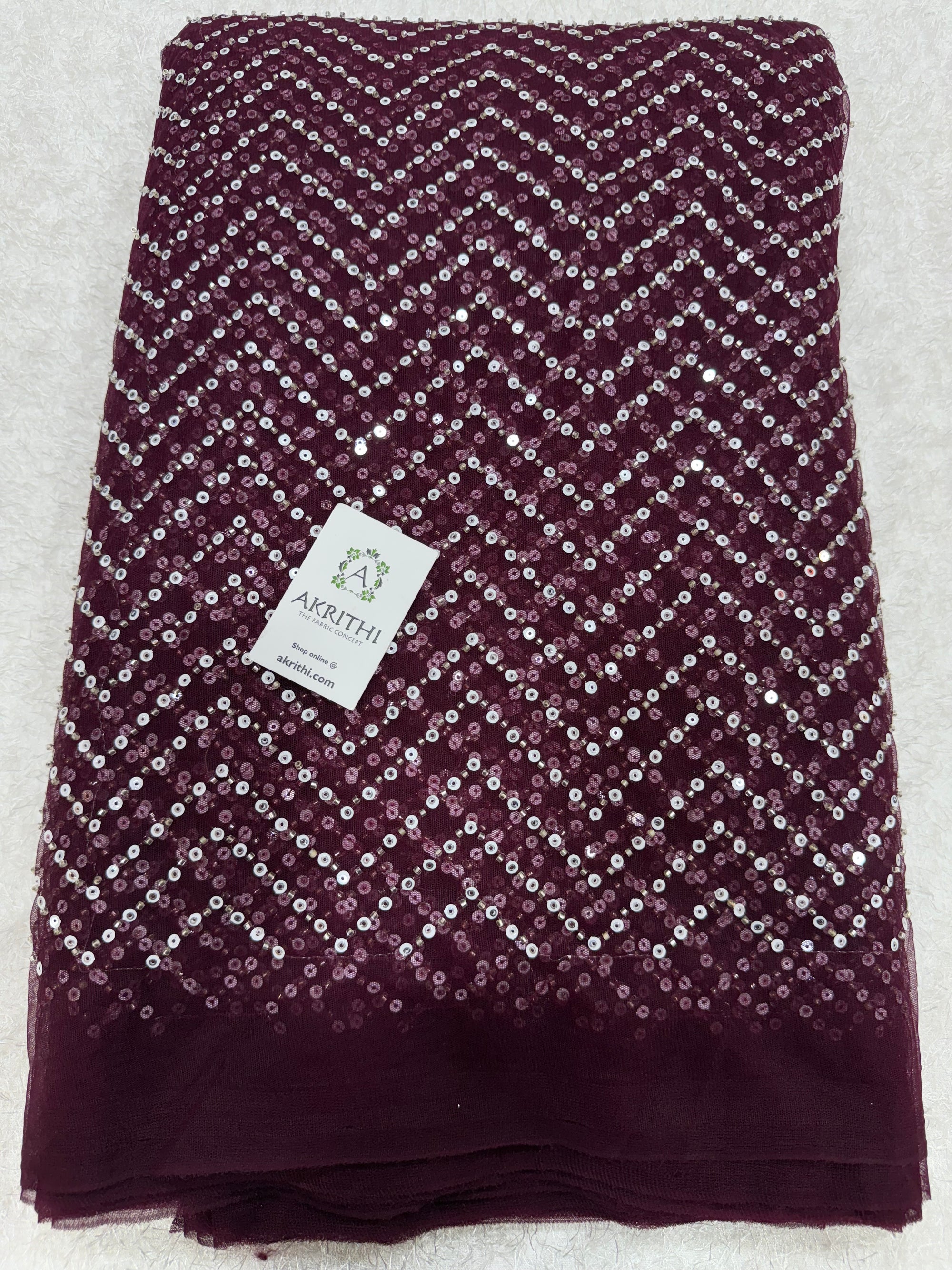 Embroidered net fabric
