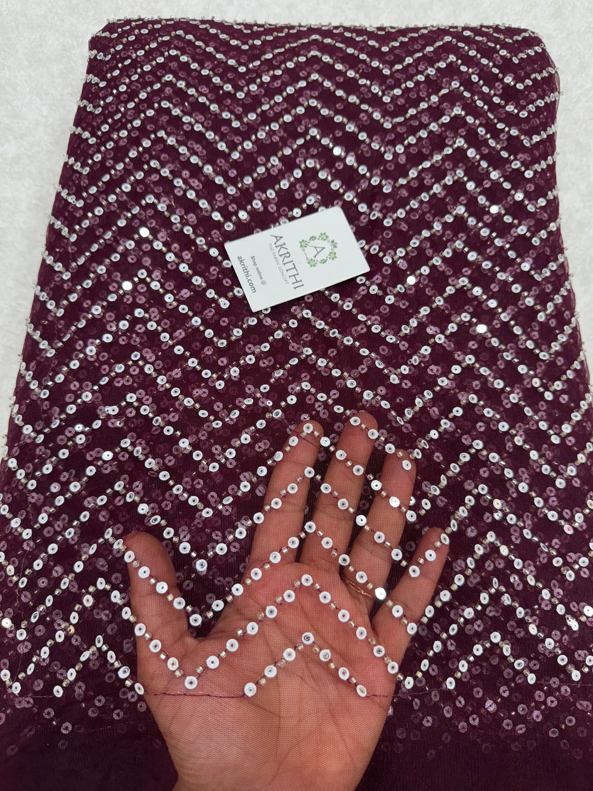 Embroidered net fabric