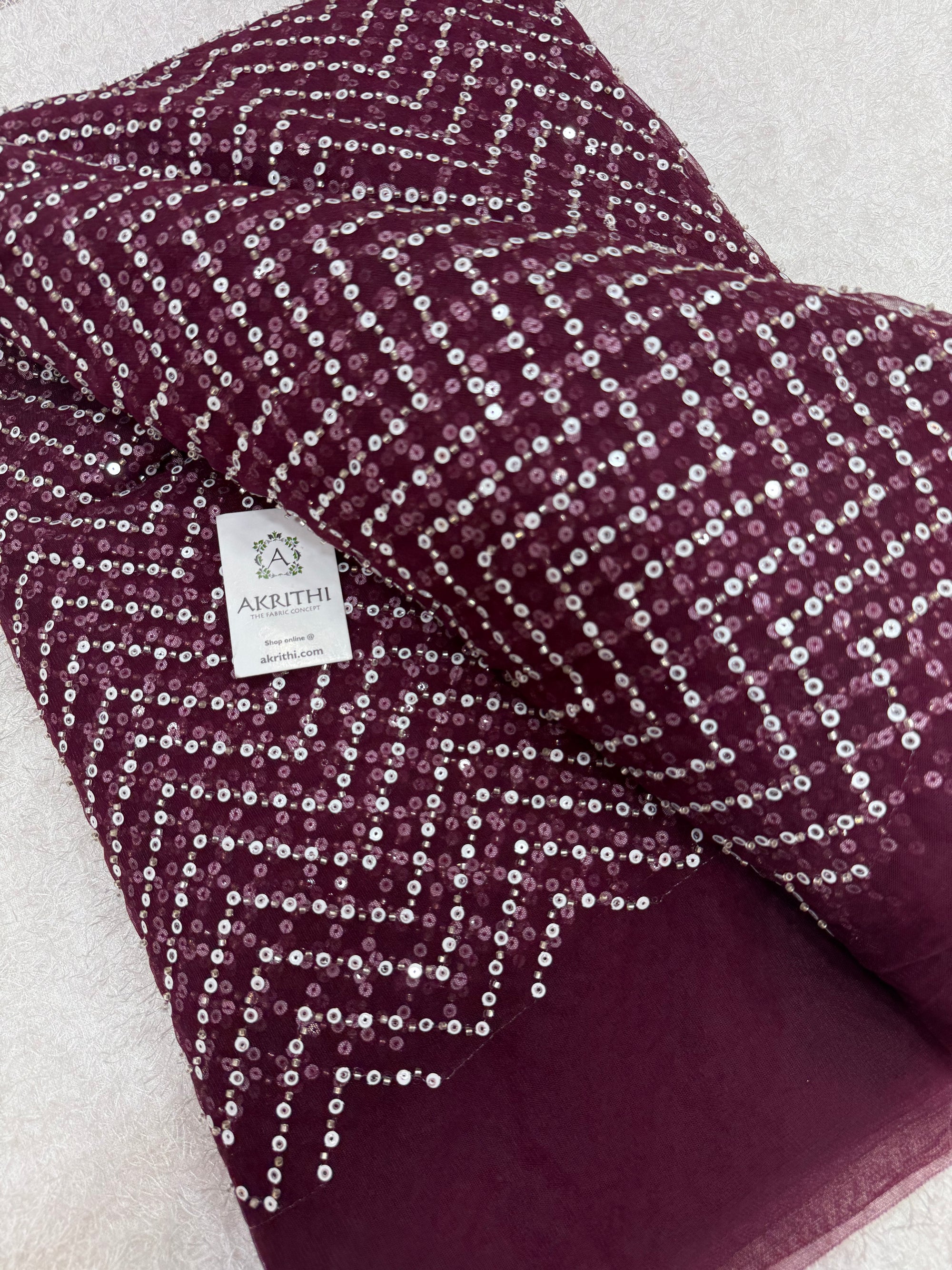 Embroidered net fabric