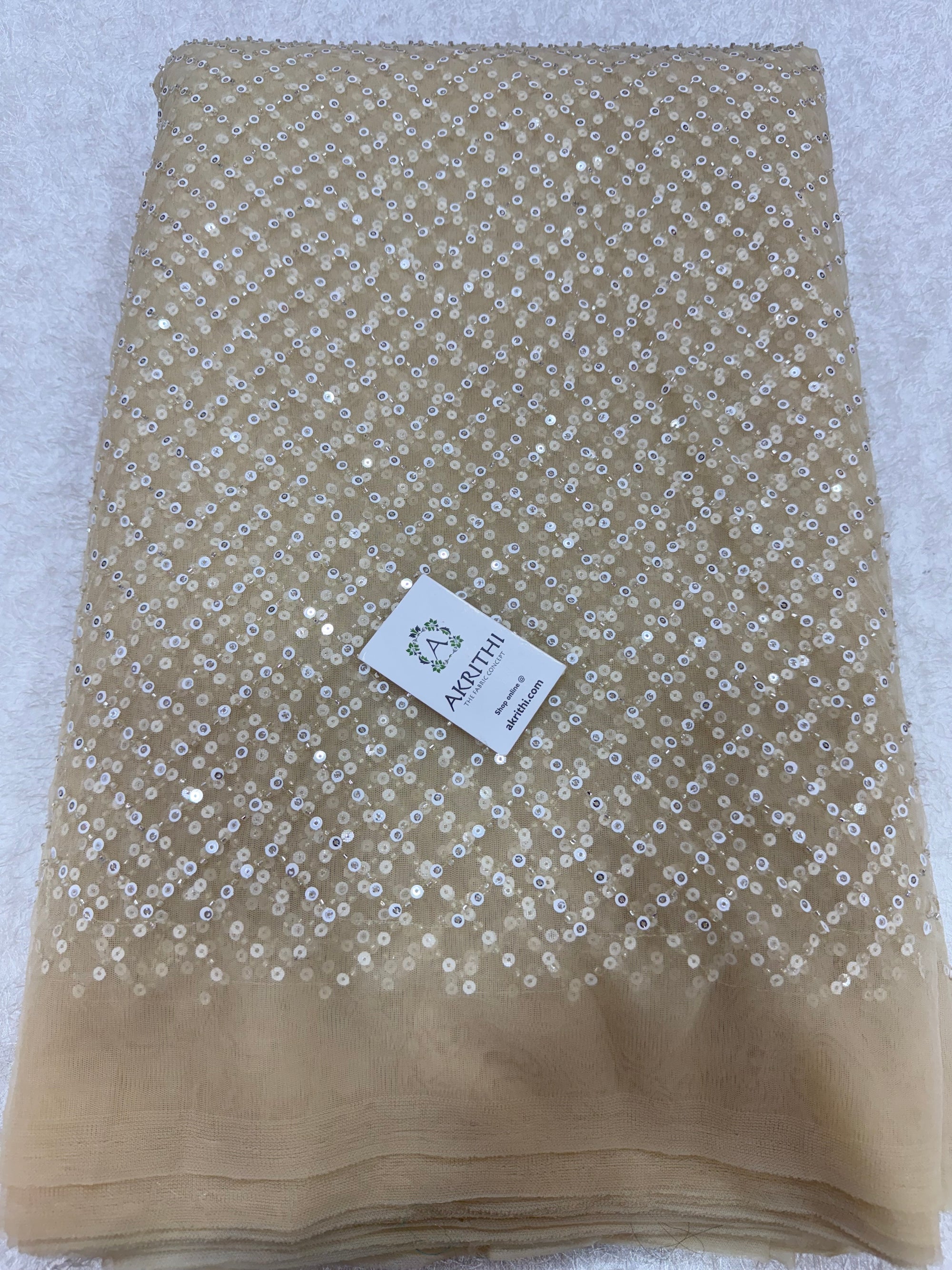 Embroidered net fabric