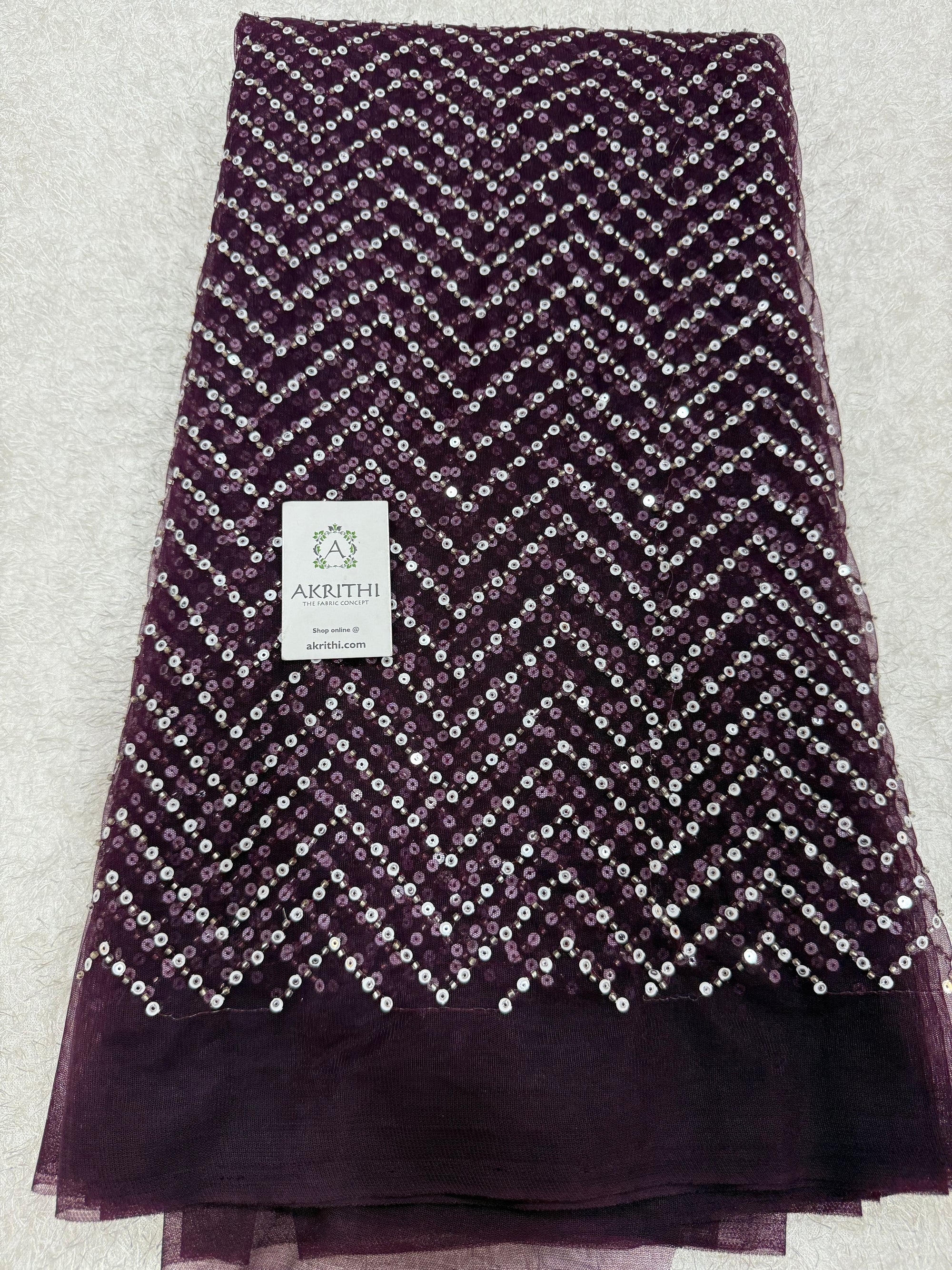 Embroidered net fabric