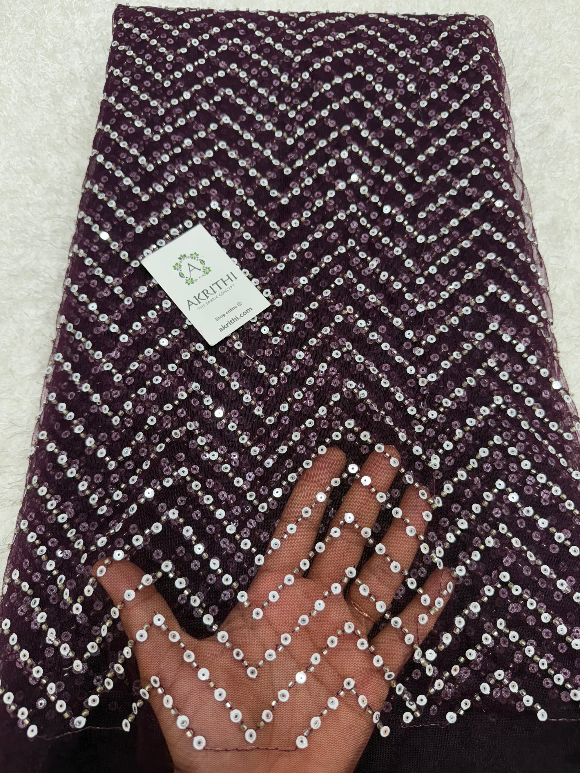 Embroidered net fabric
