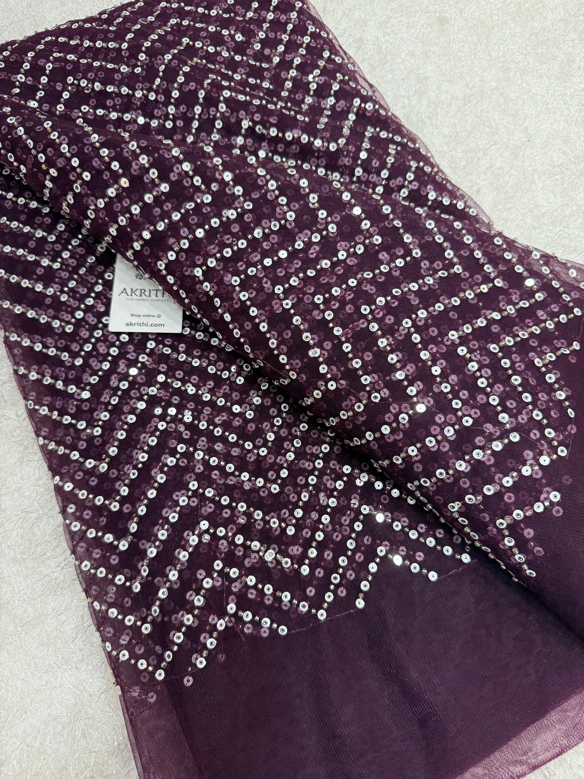 Embroidered net fabric