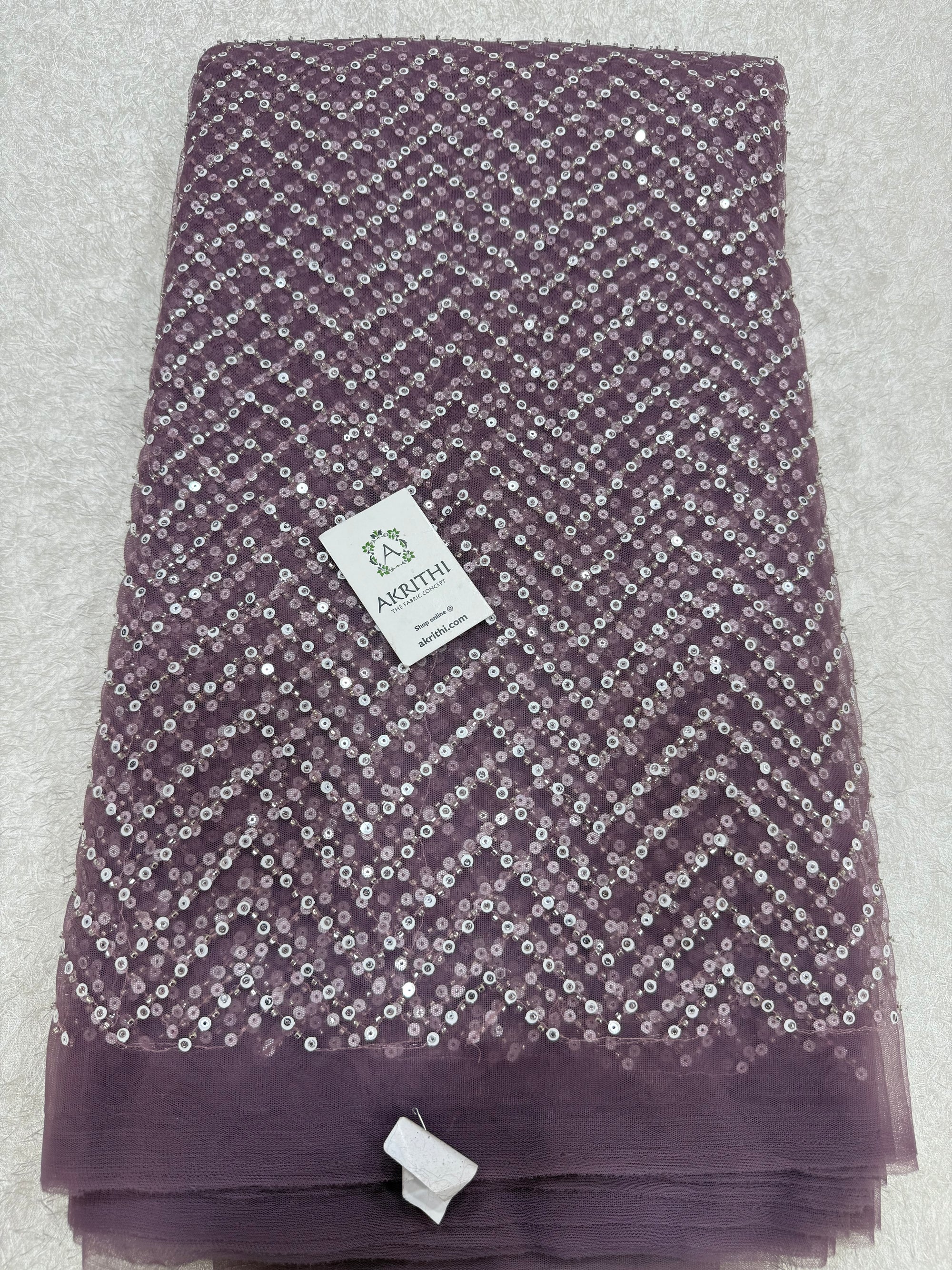 Embroidered net fabric