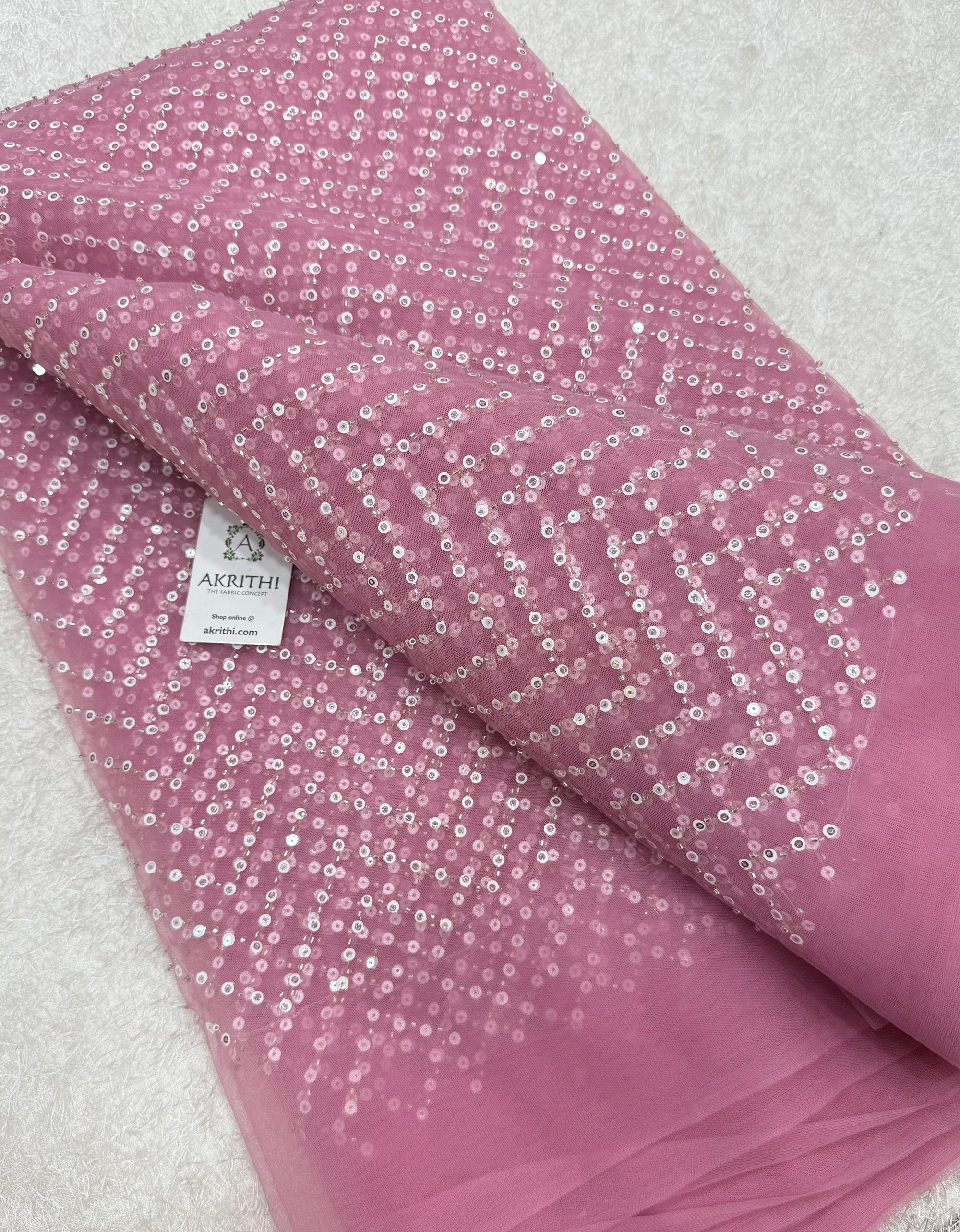 Embroidered net fabric