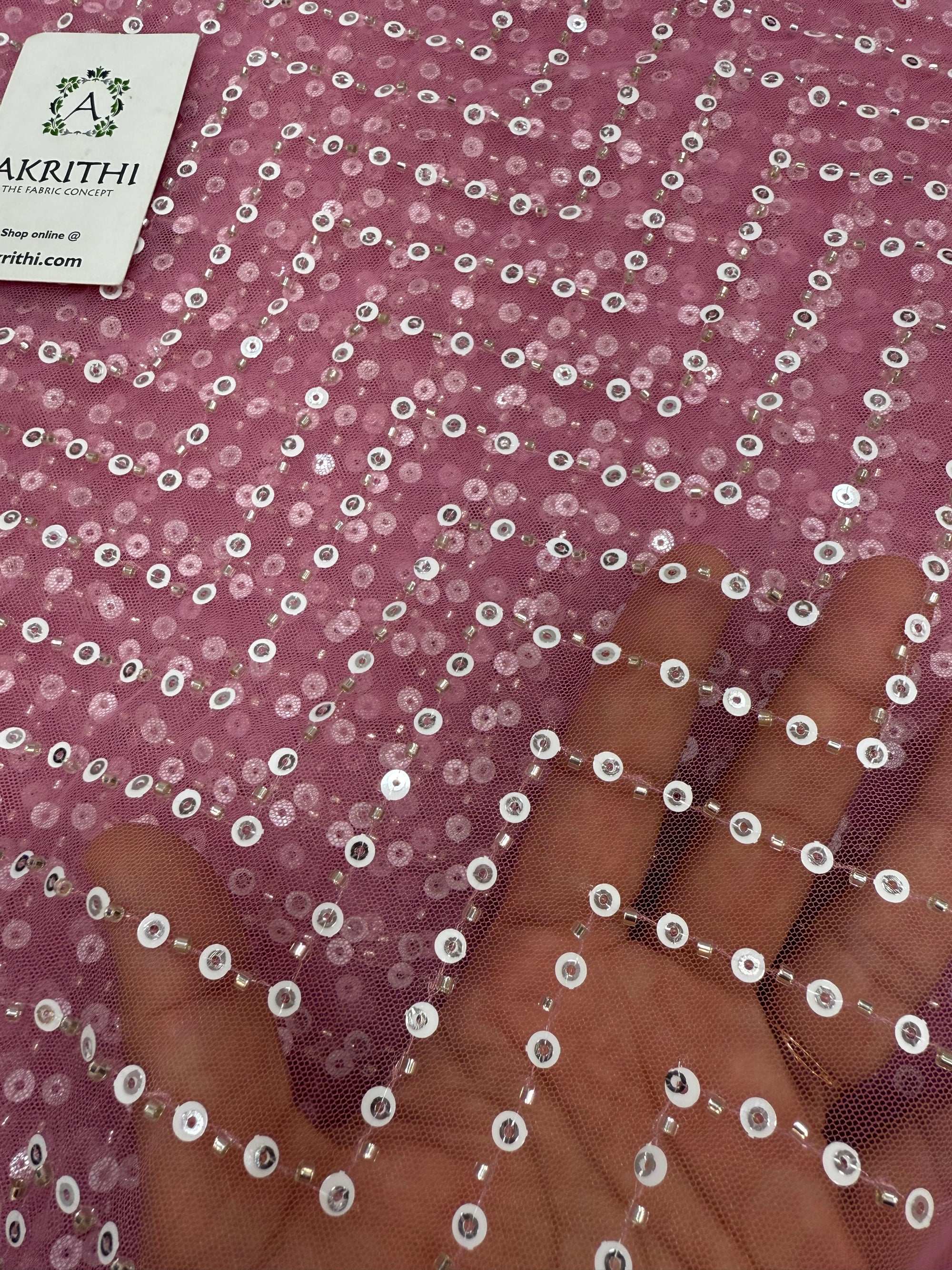 Embroidered net fabric