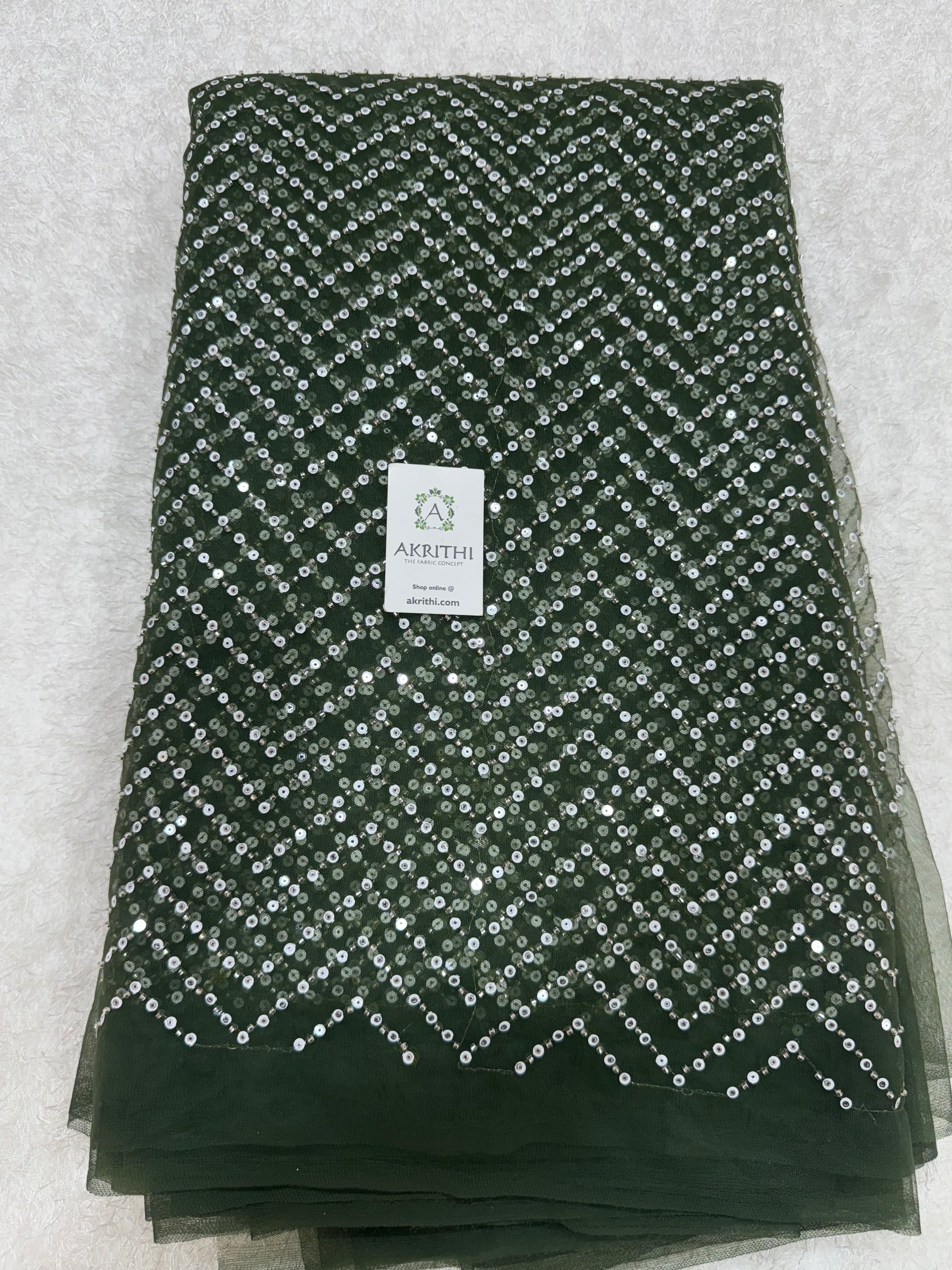 Embroidered net fabric