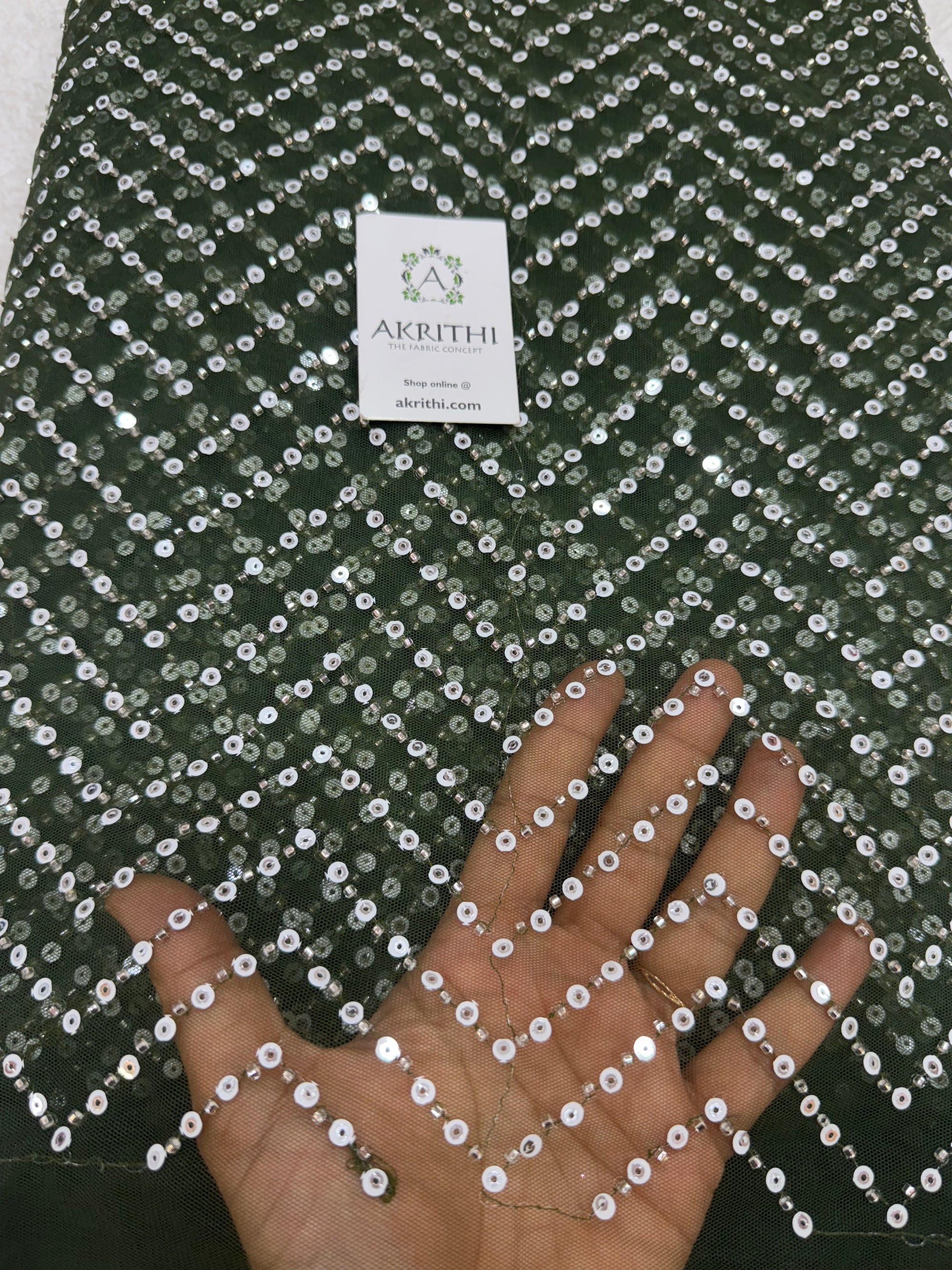 Embroidered net fabric
