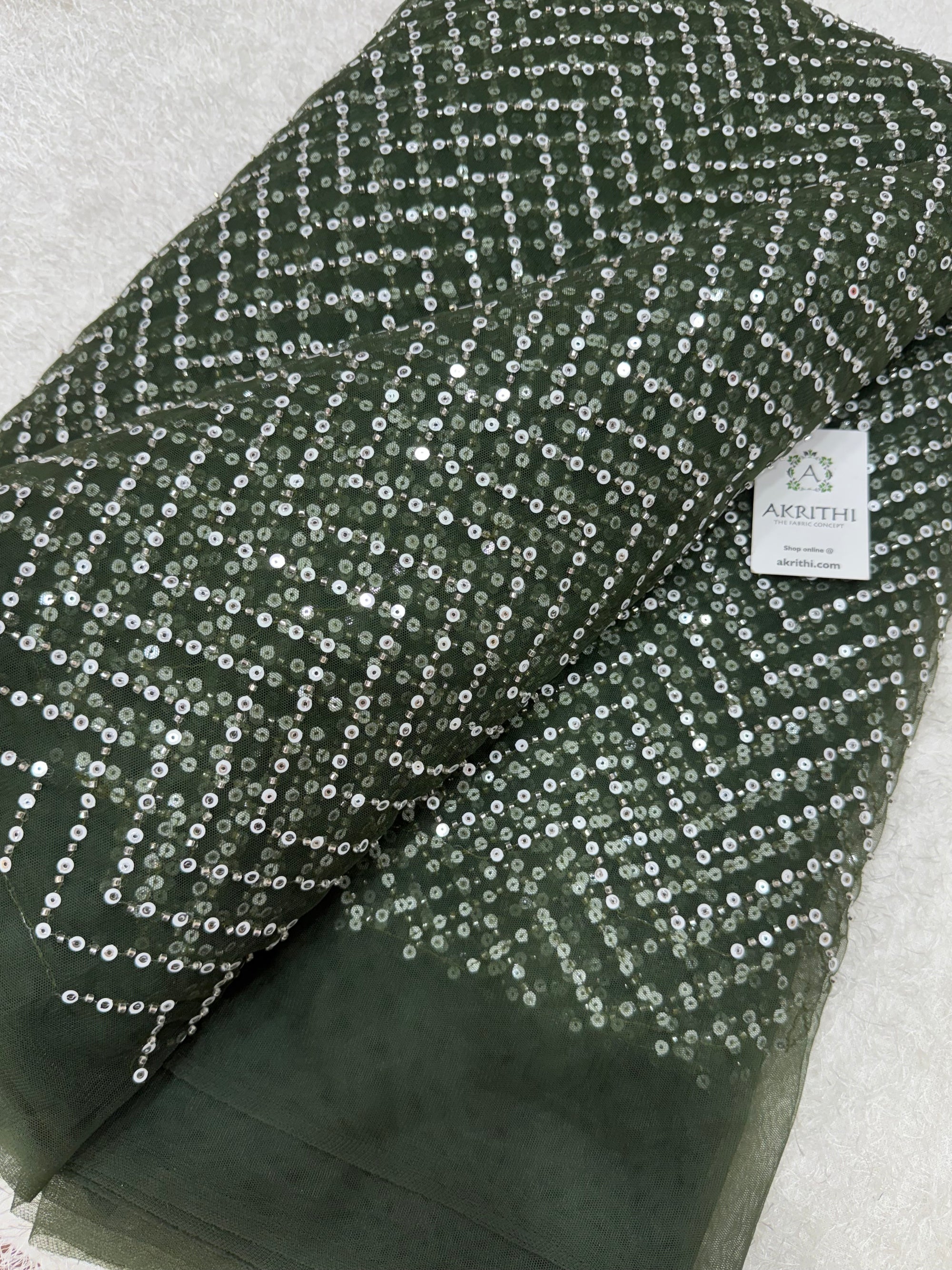 Embroidered net fabric