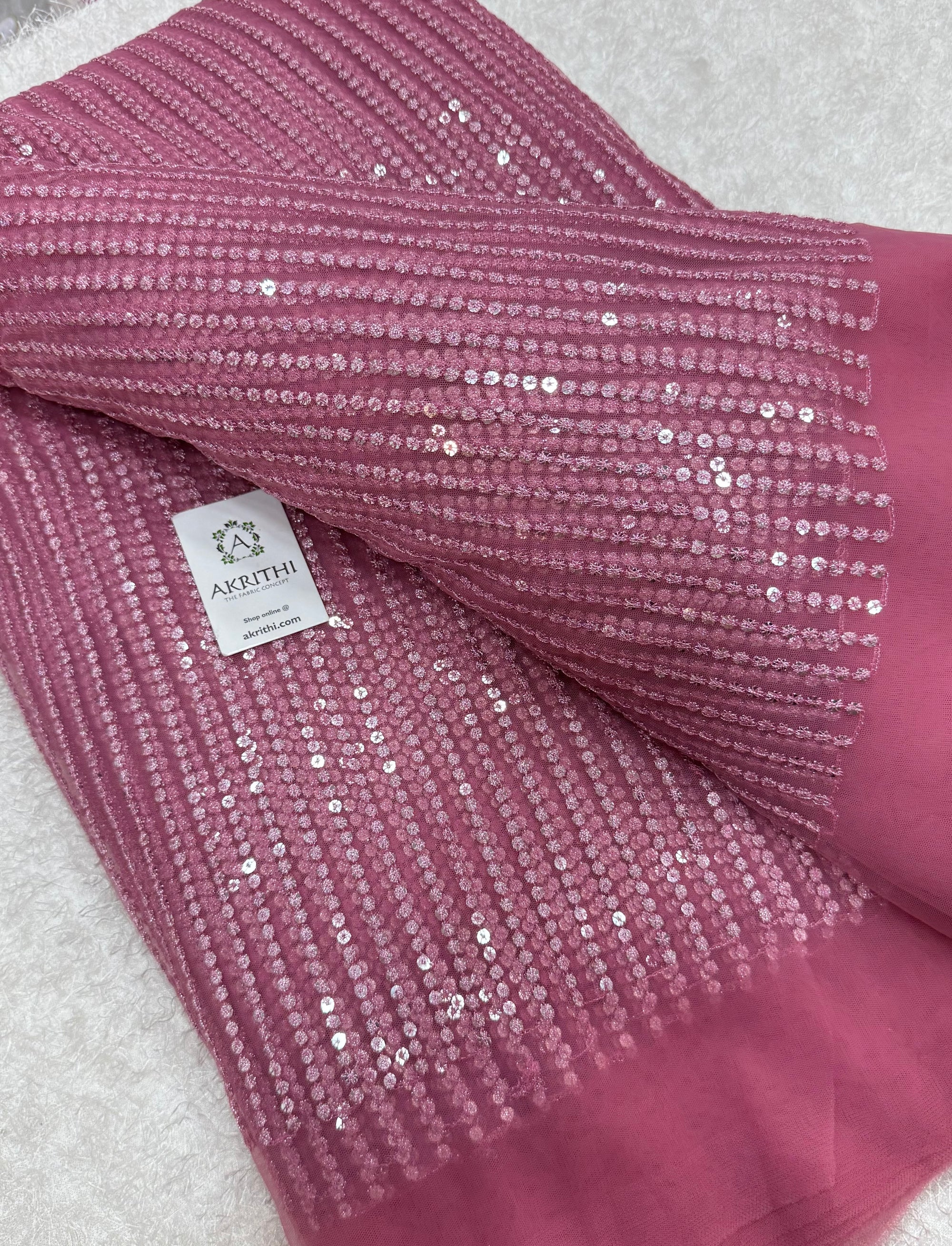 Embroidered net fabric