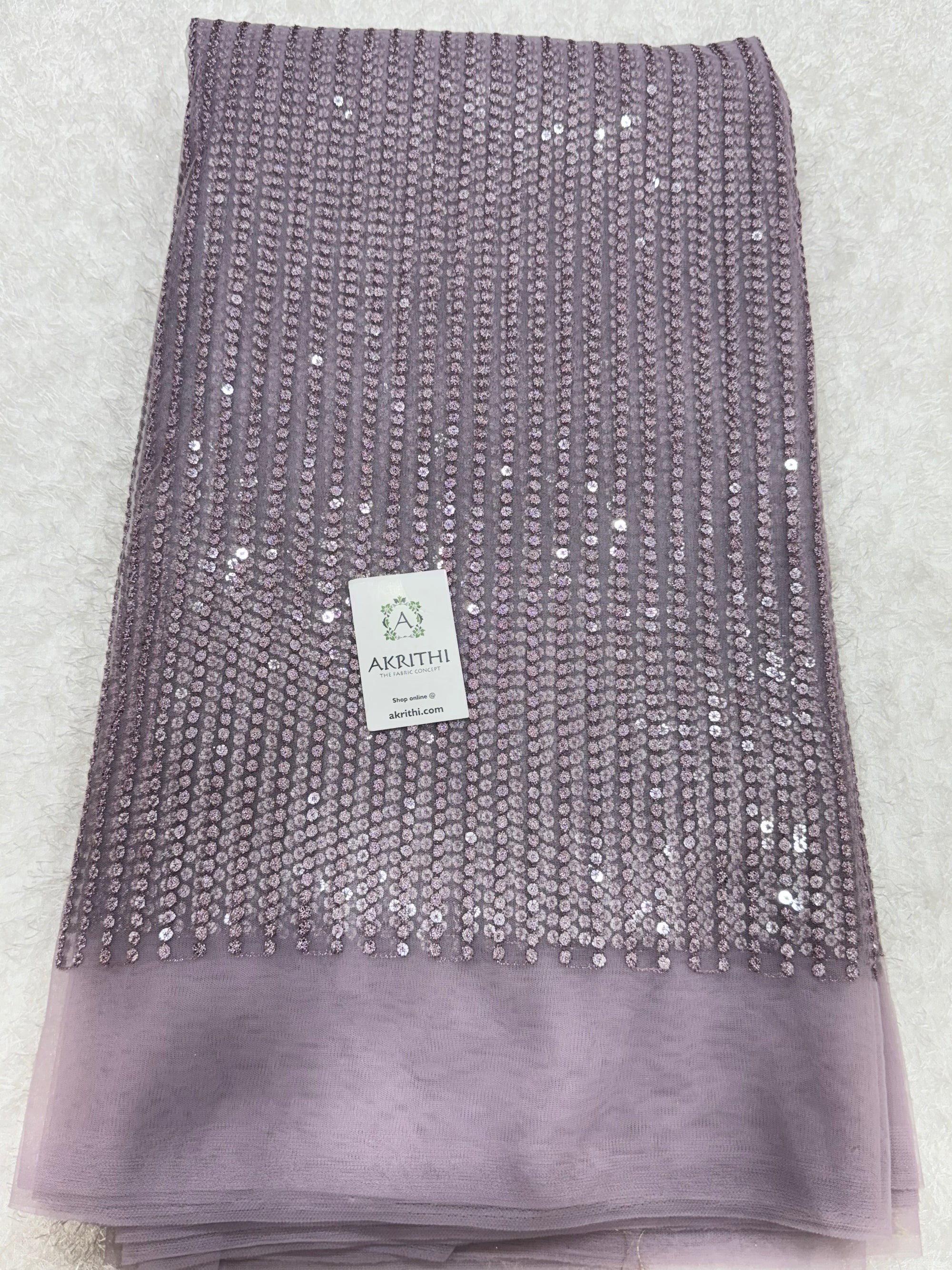 Embroidered net fabric