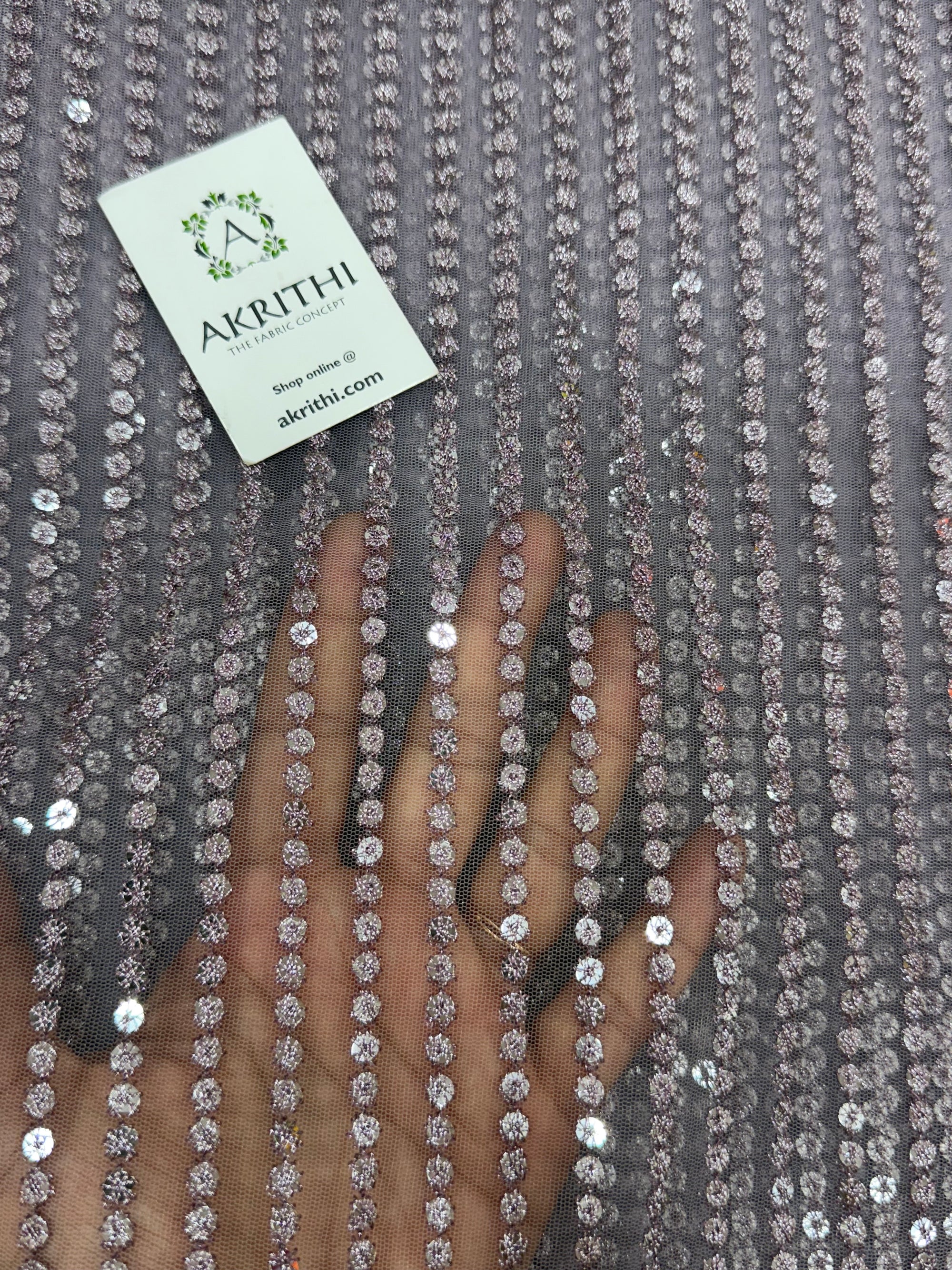 Embroidered net fabric