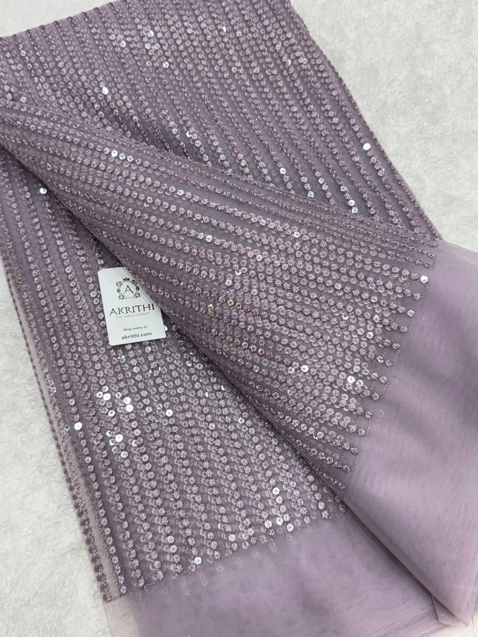 Embroidered net fabric