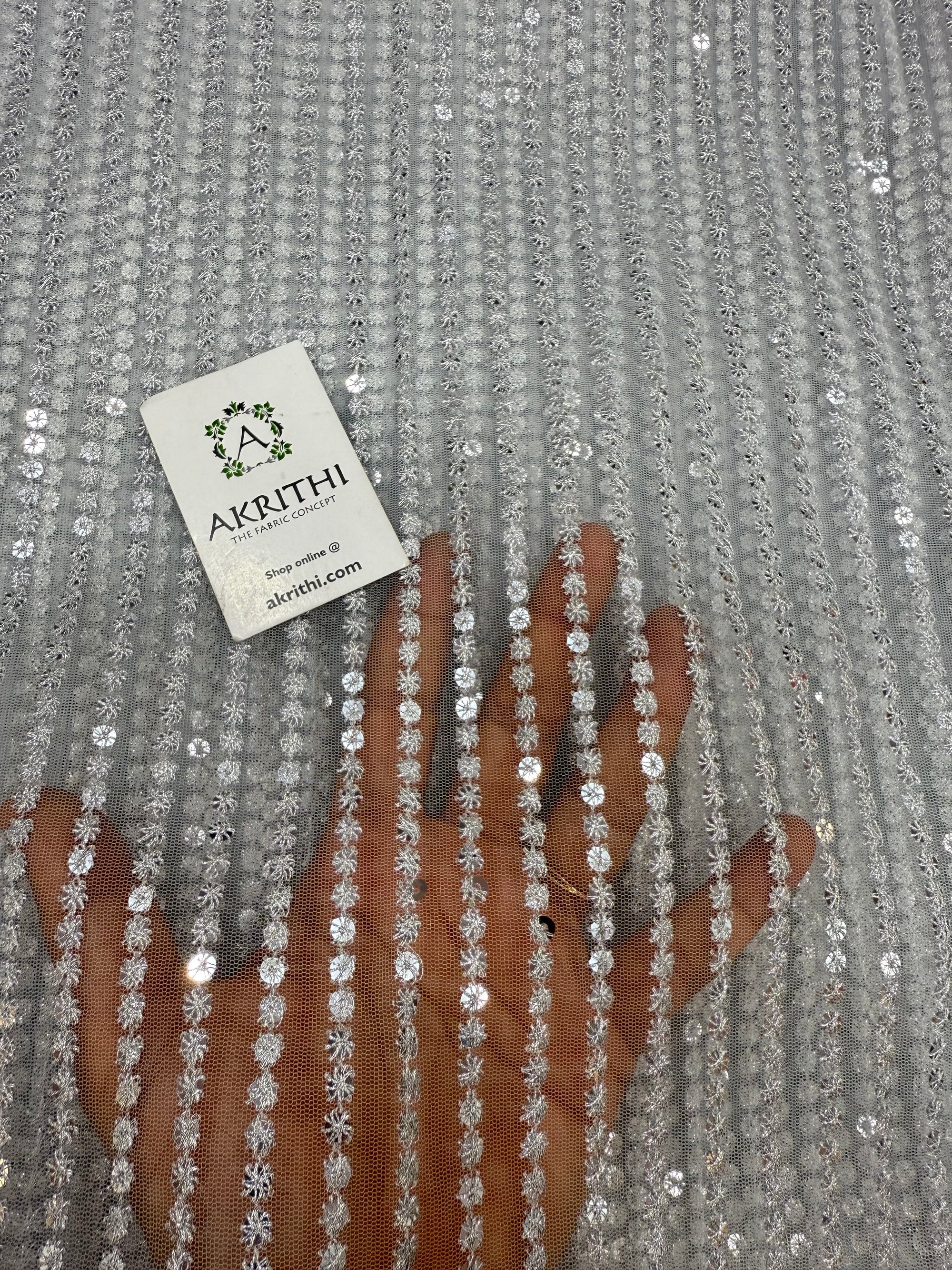 Embroidered net fabric