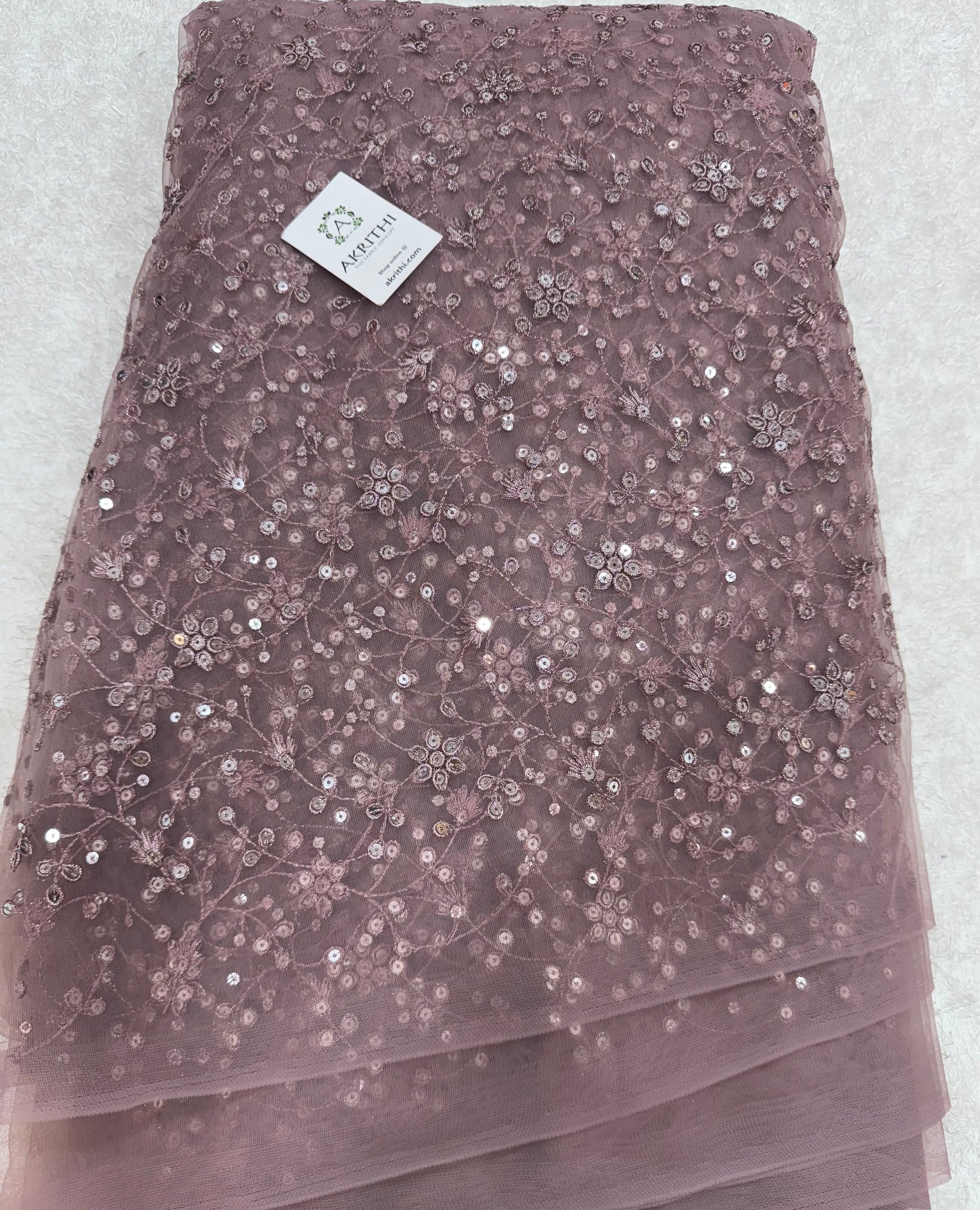 Embroidered net fabric