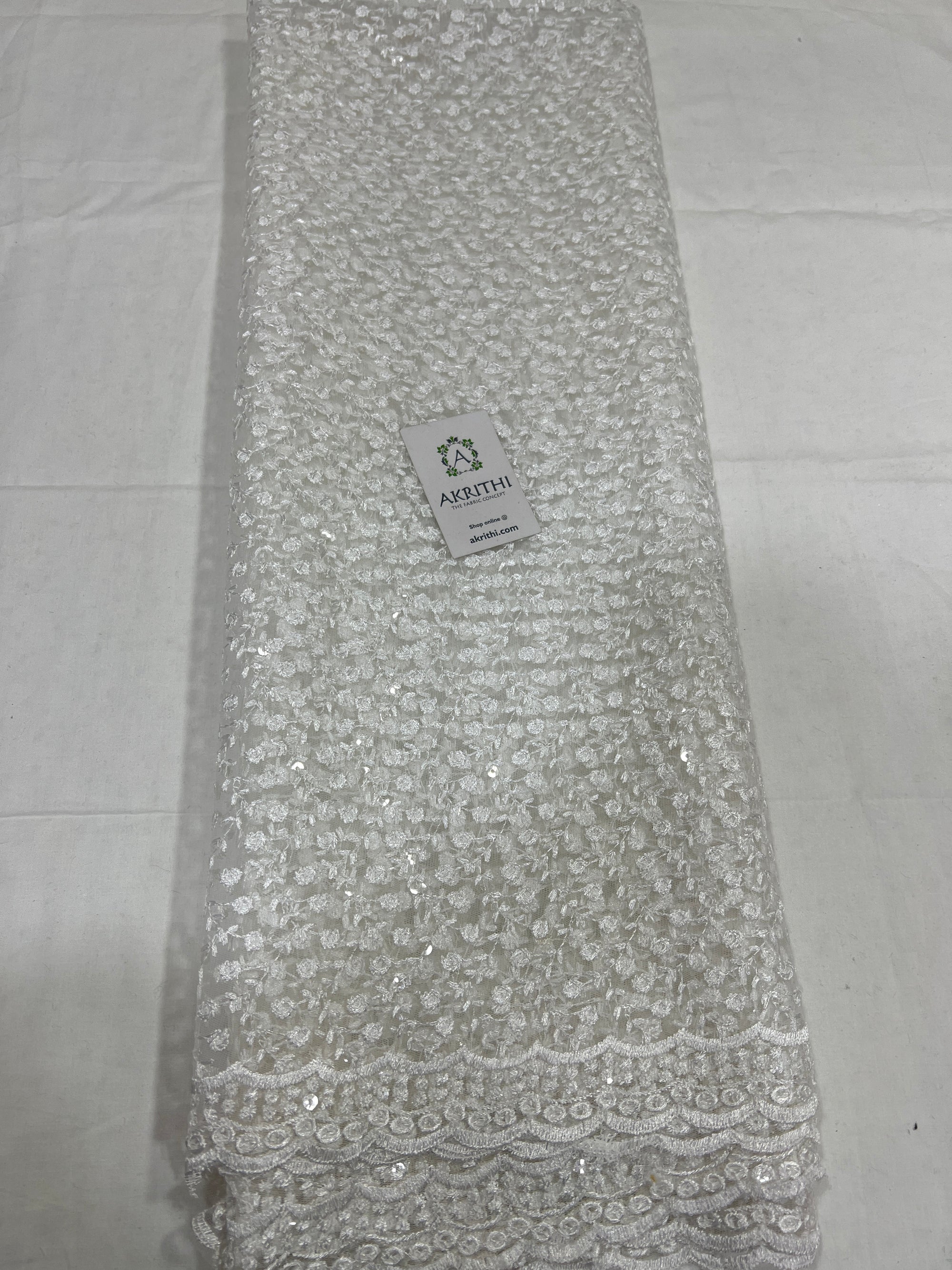 Self Embroidery on net fabric