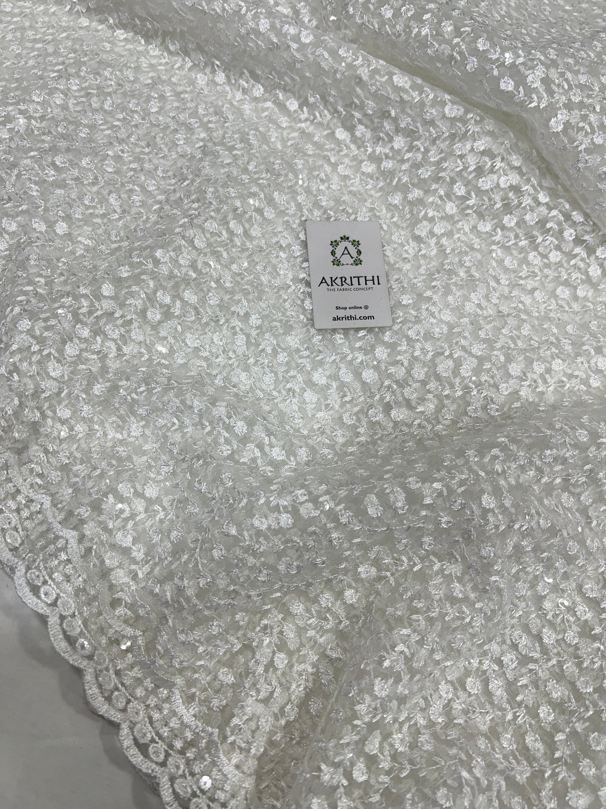 Self Embroidery on net fabric