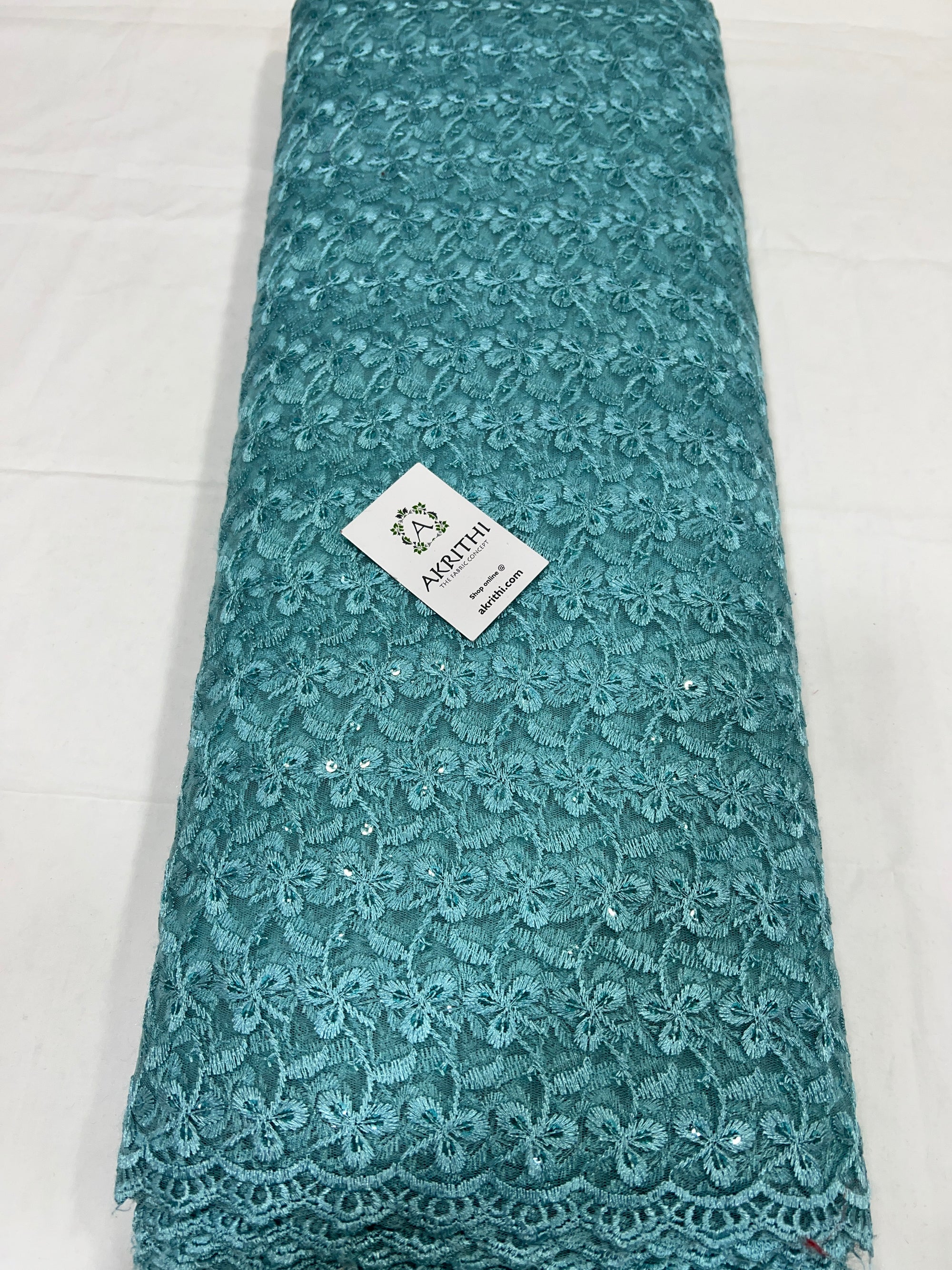 Self Embroidery on net fabric