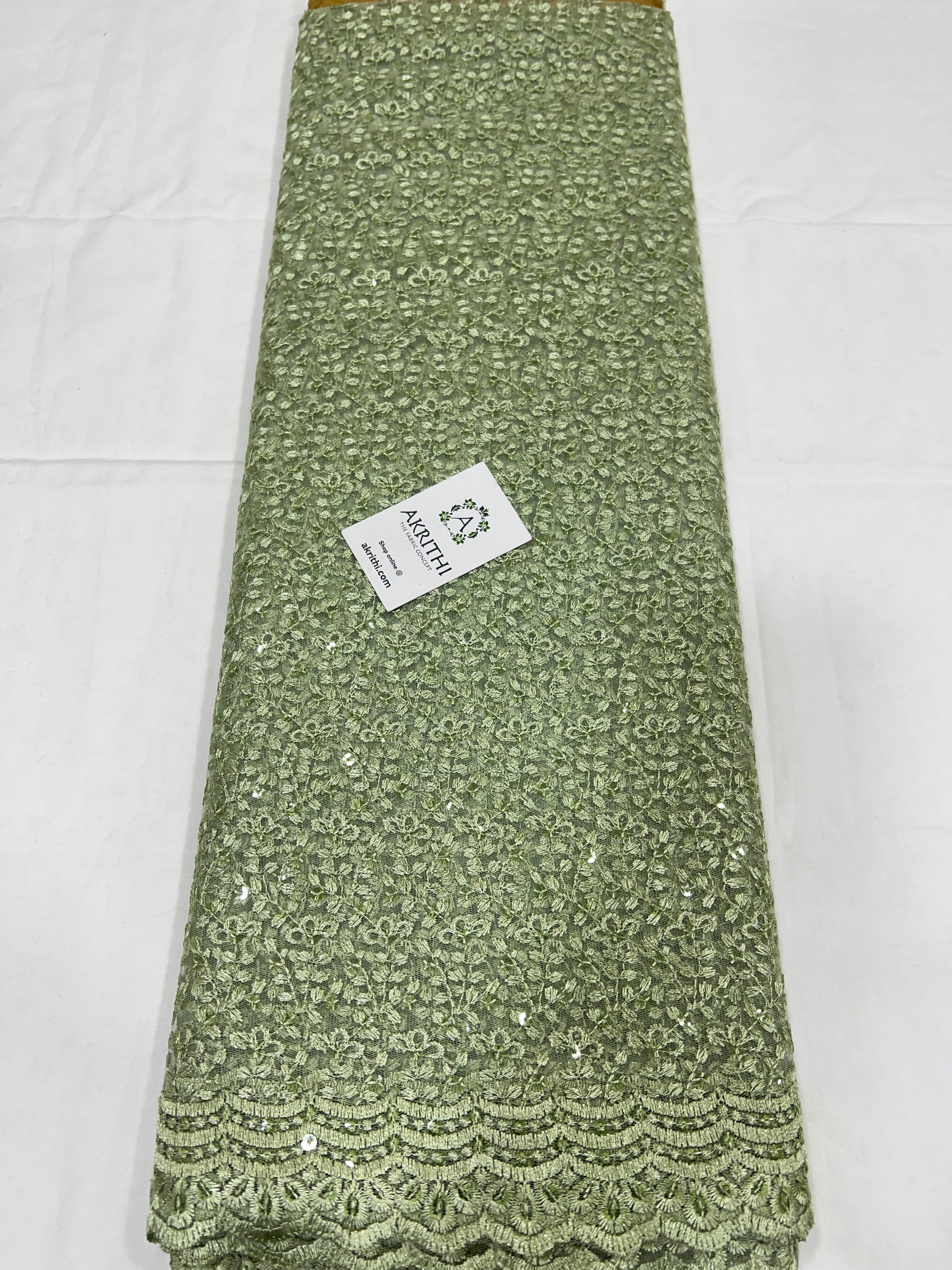 Self Embroidery on net fabric
