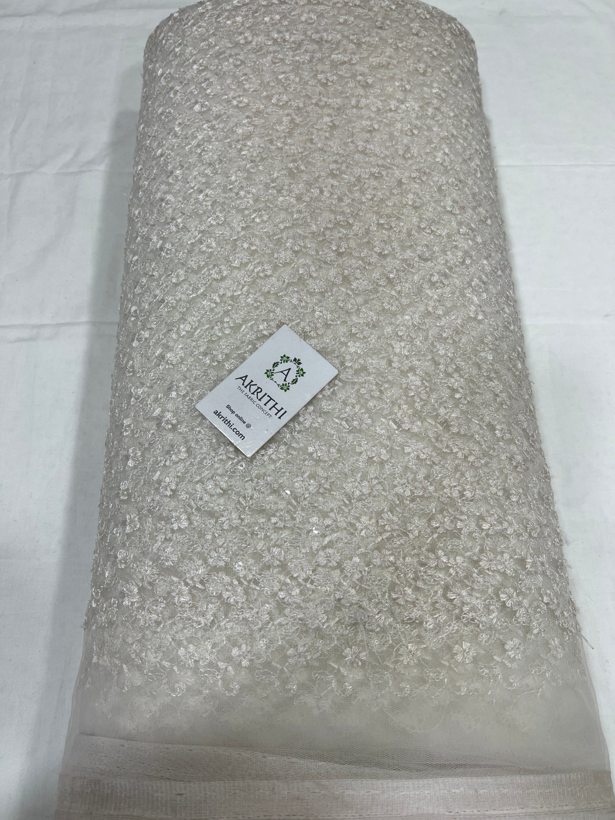 Self Embroidery on net fabric