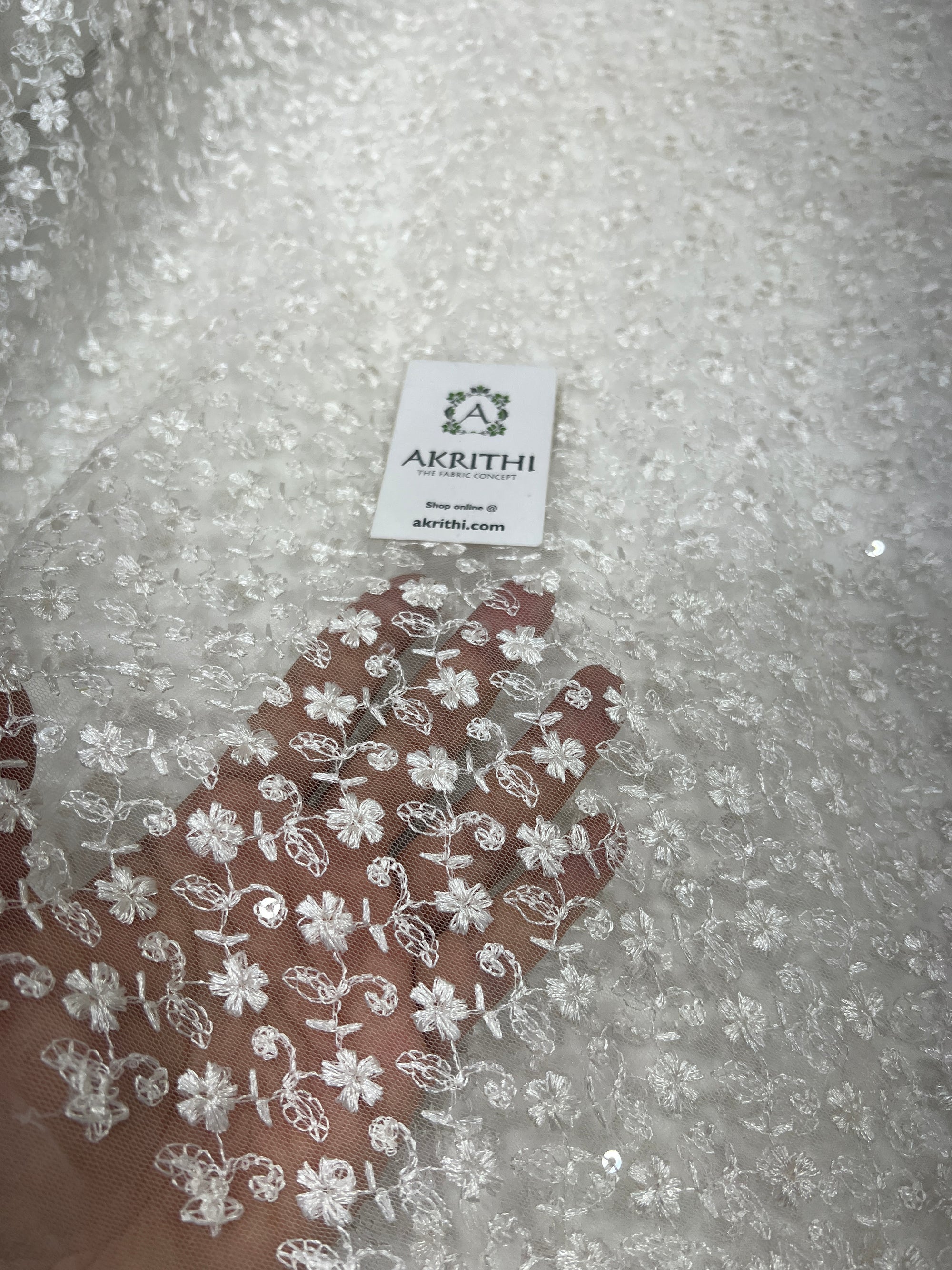 Self Embroidery on net fabric