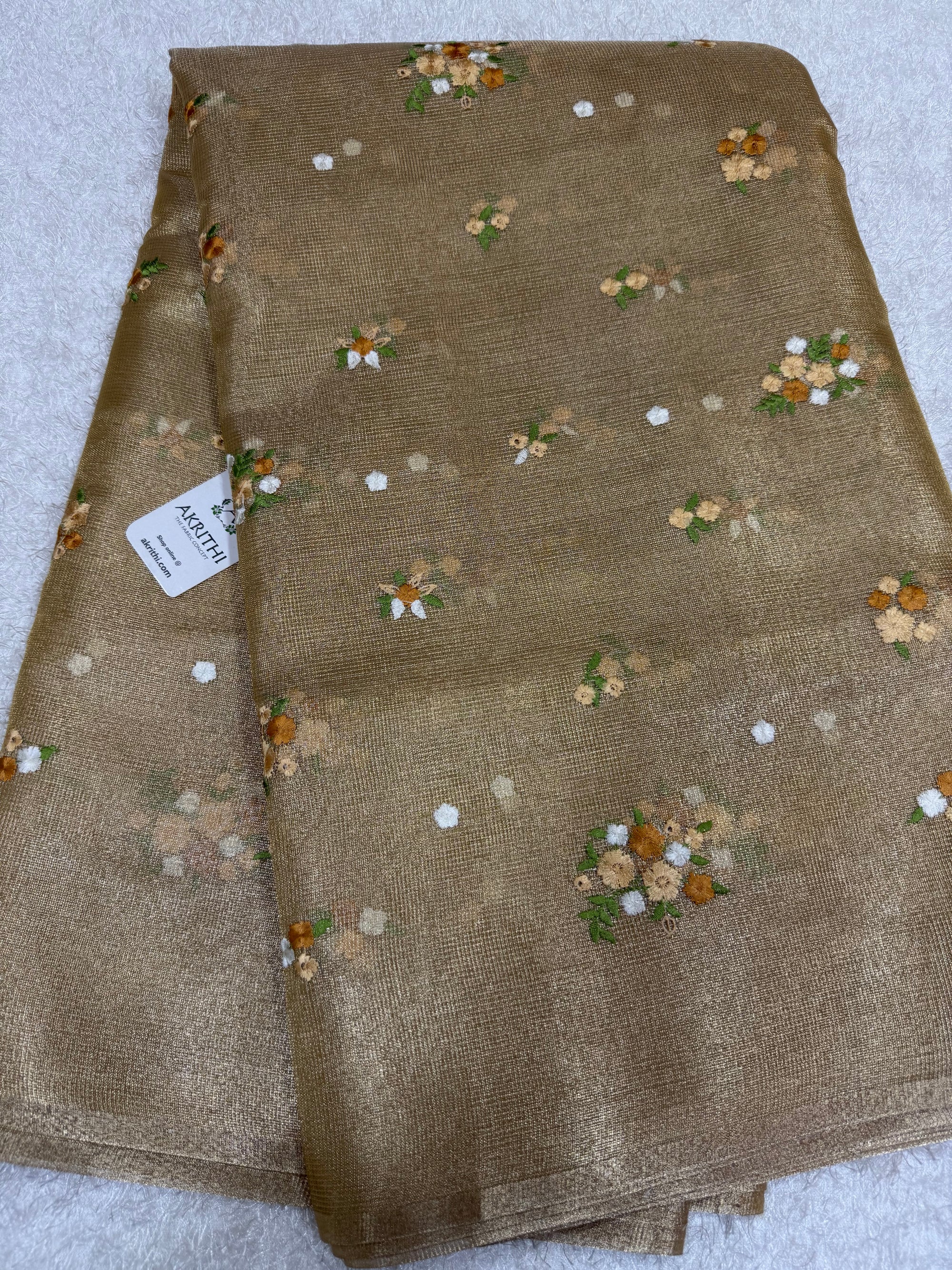 Embroidered tissue net fabric