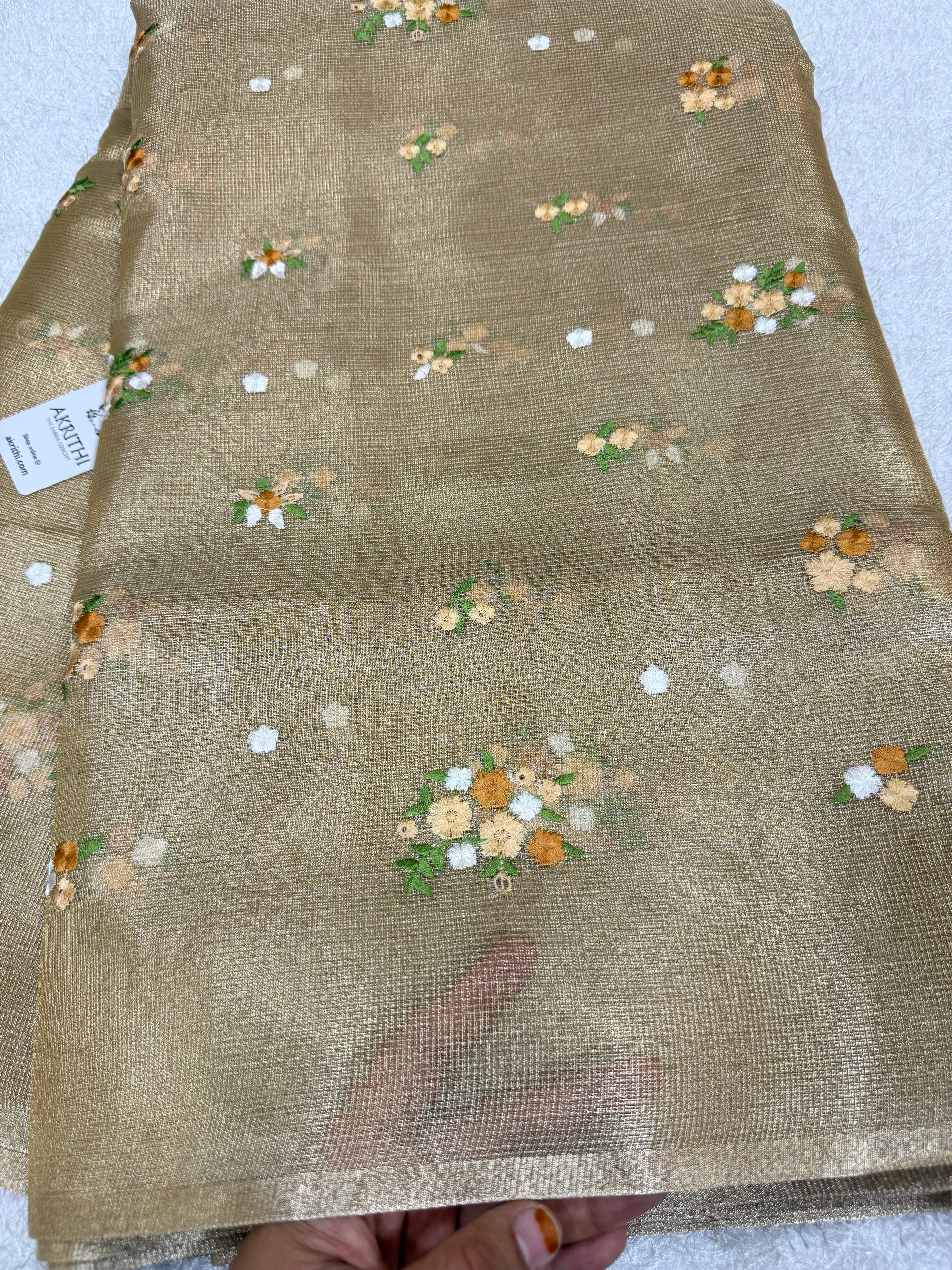 Embroidered tissue net fabric