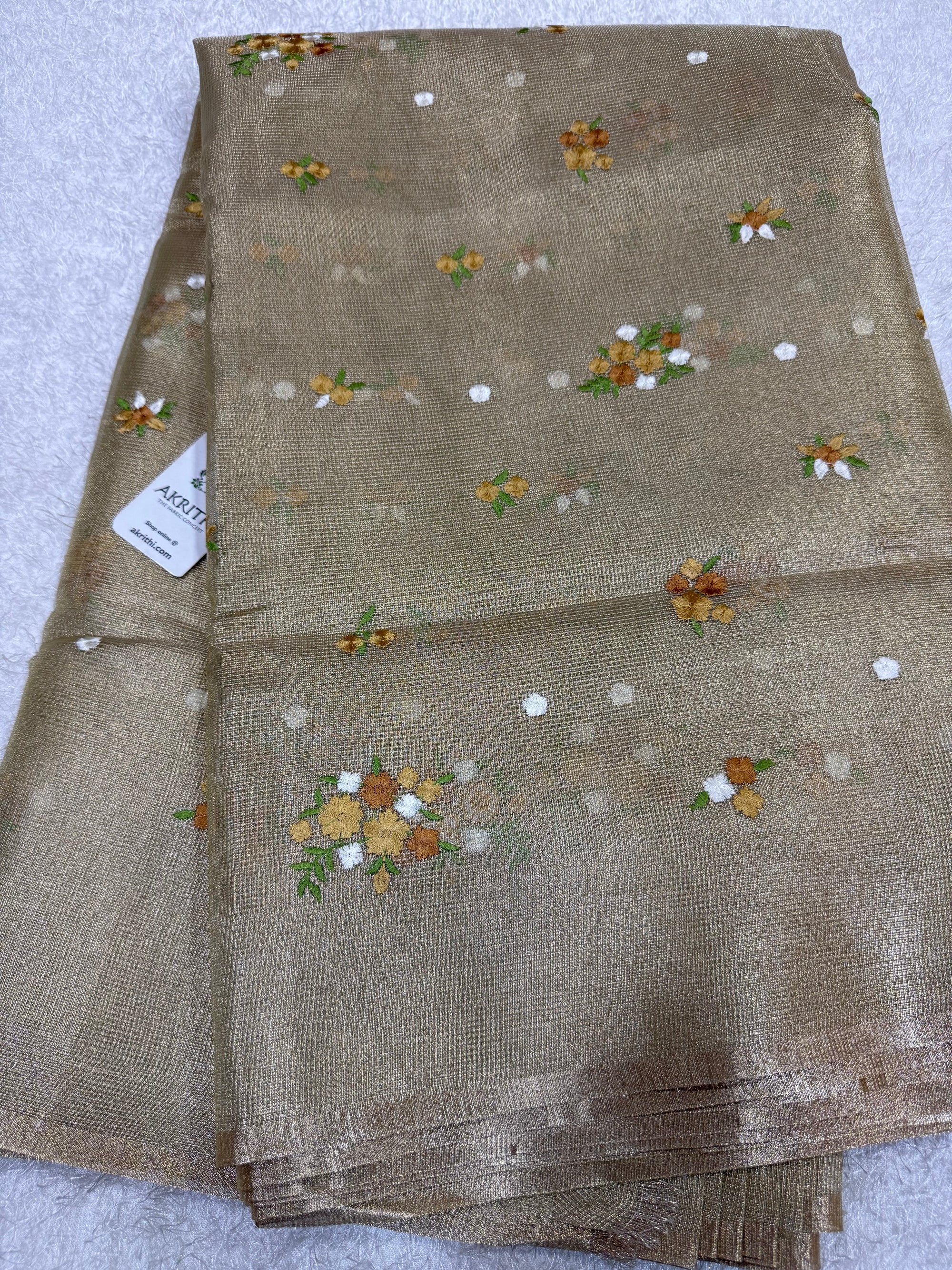 Embroidered tissue net fabric
