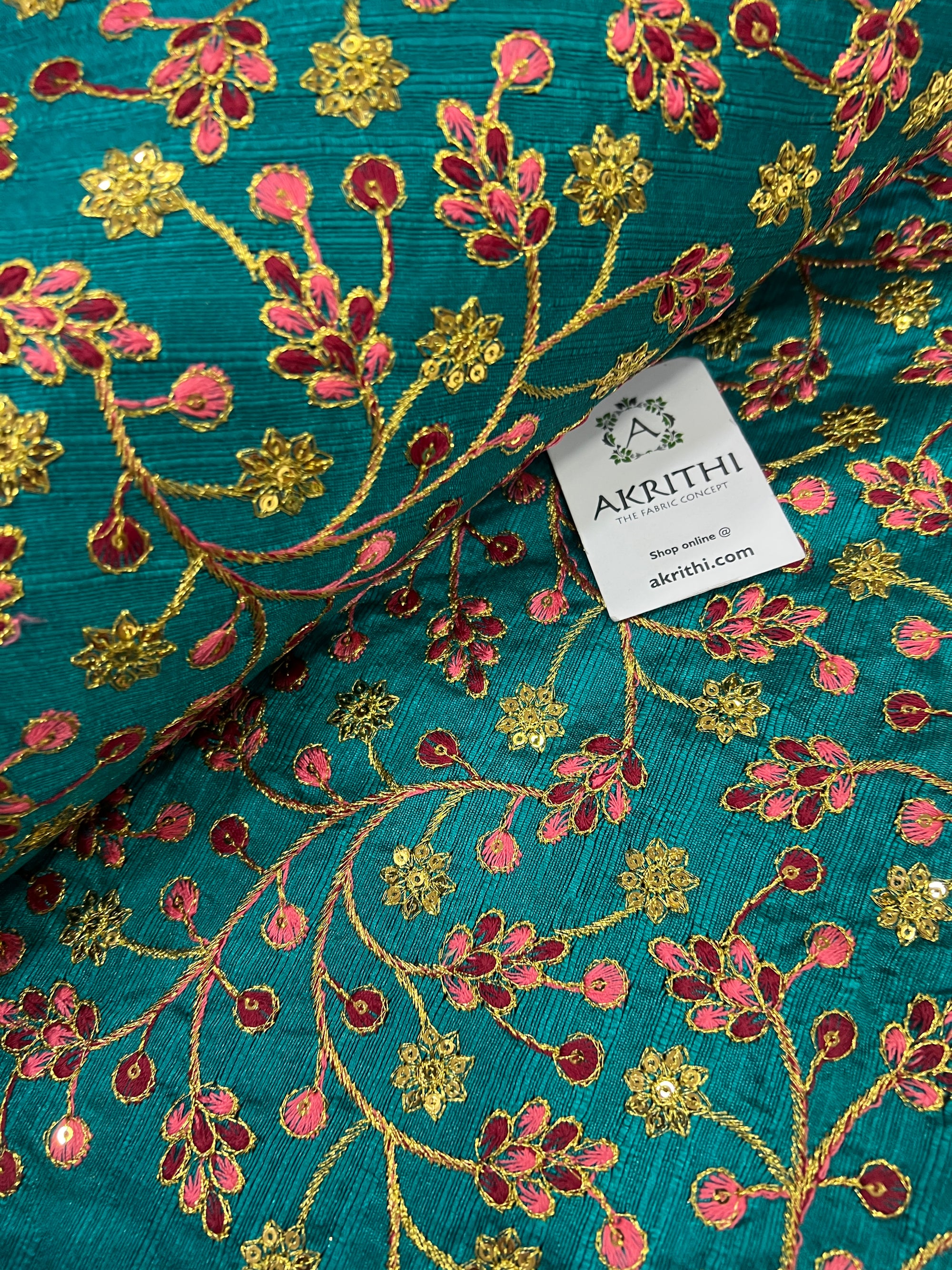 Embroidered raw silk fabric