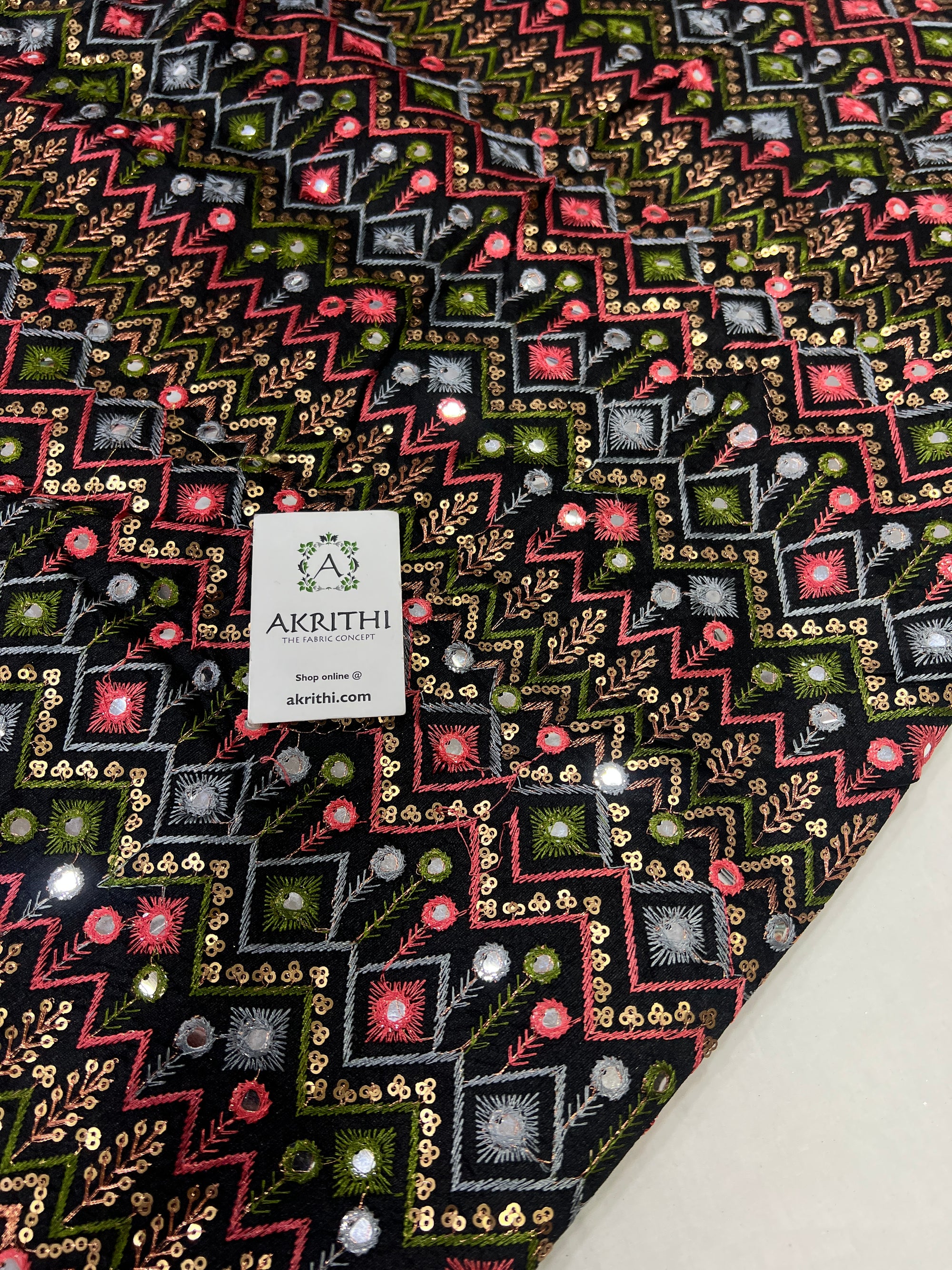 Embroidered raw silk fabric