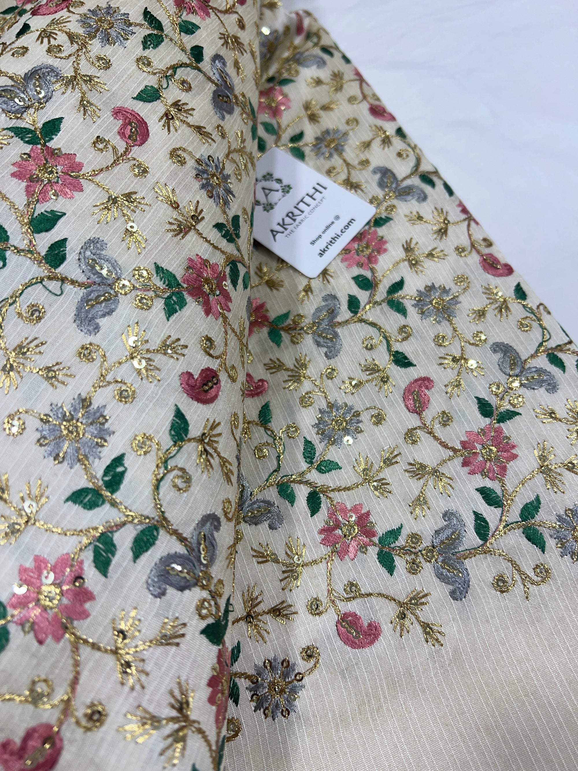 Embroidered raw silk fabric