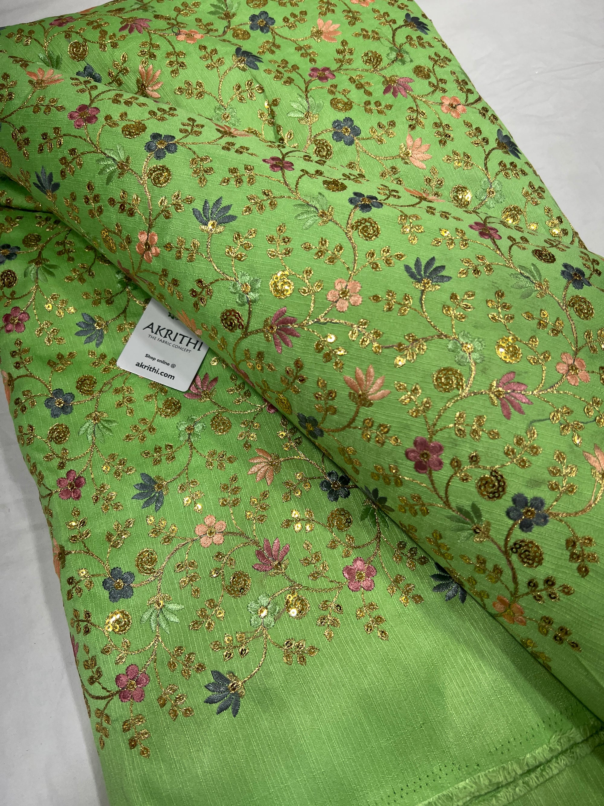 Embroidered raw silk fabric