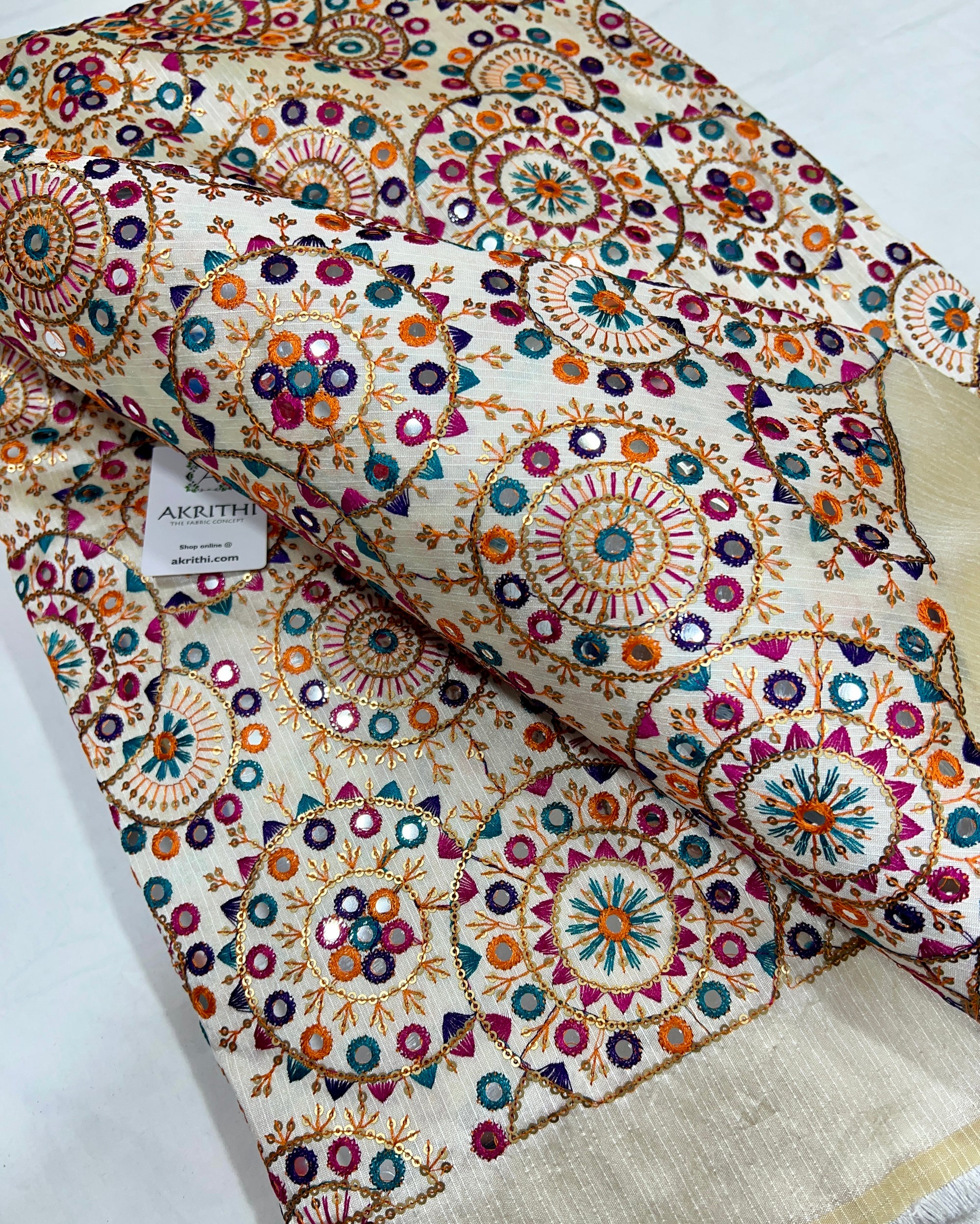 Embroidered raw silk fabric