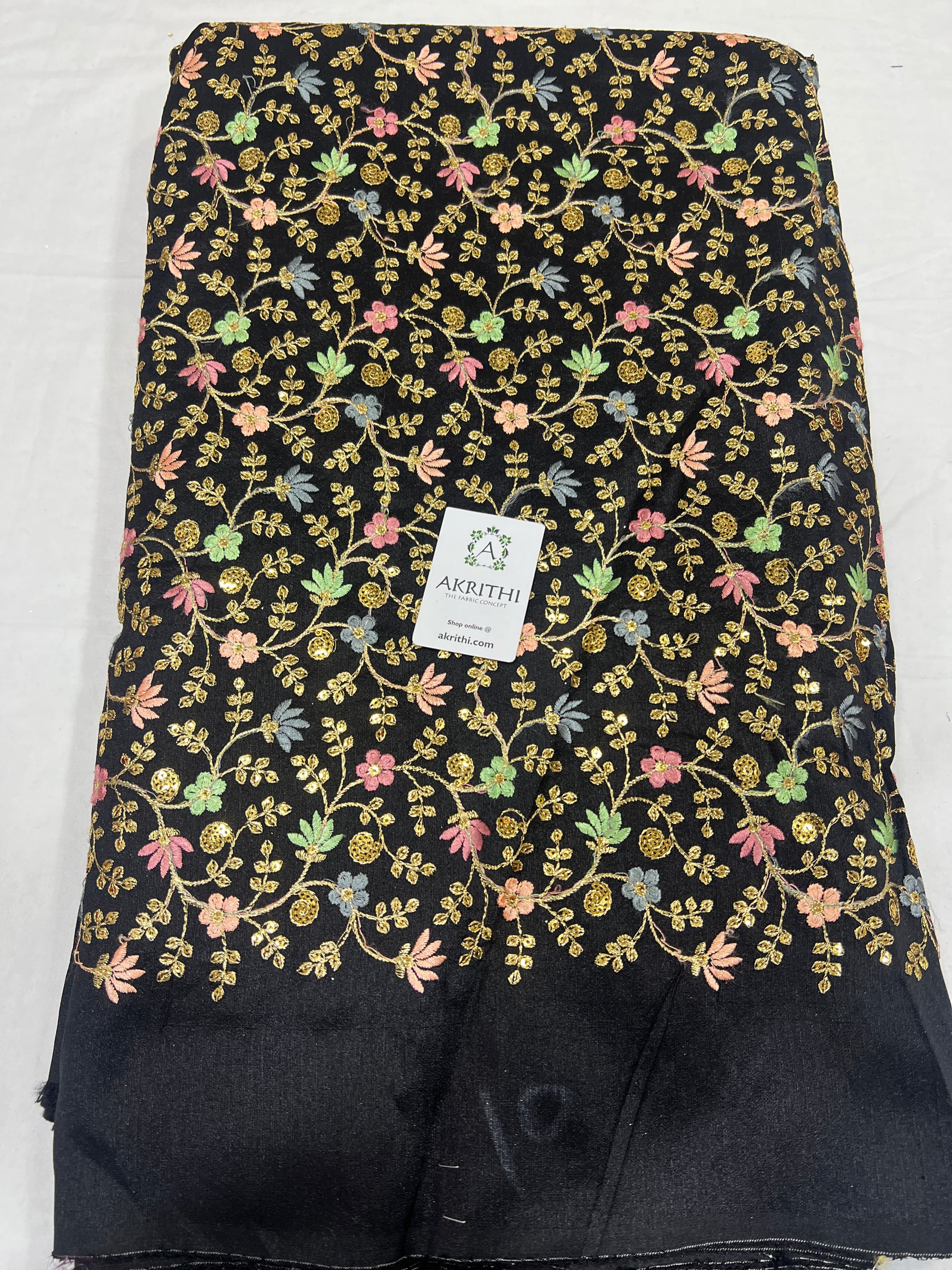 Embroidered raw silk fabric