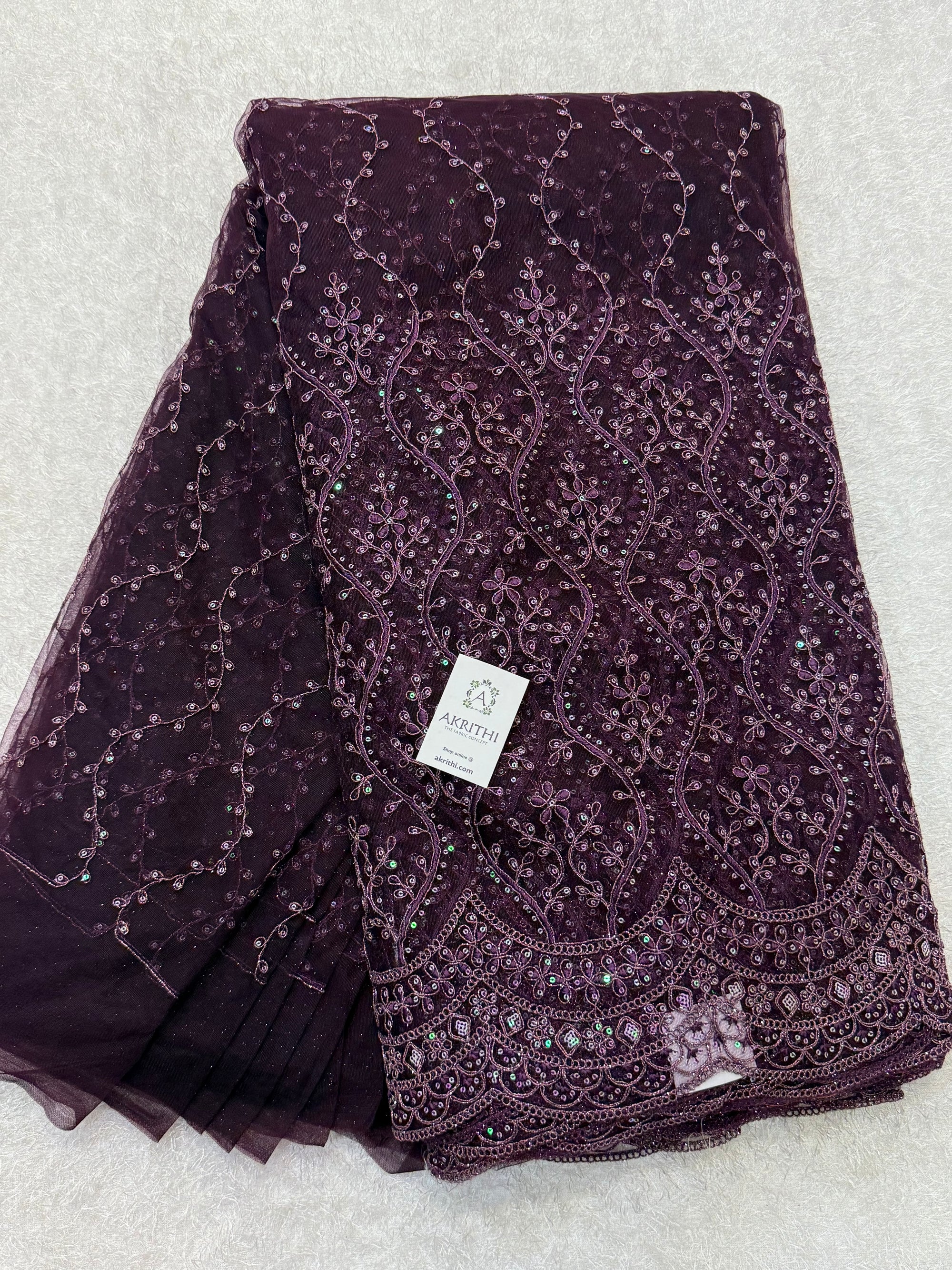 Embroidered net fabric