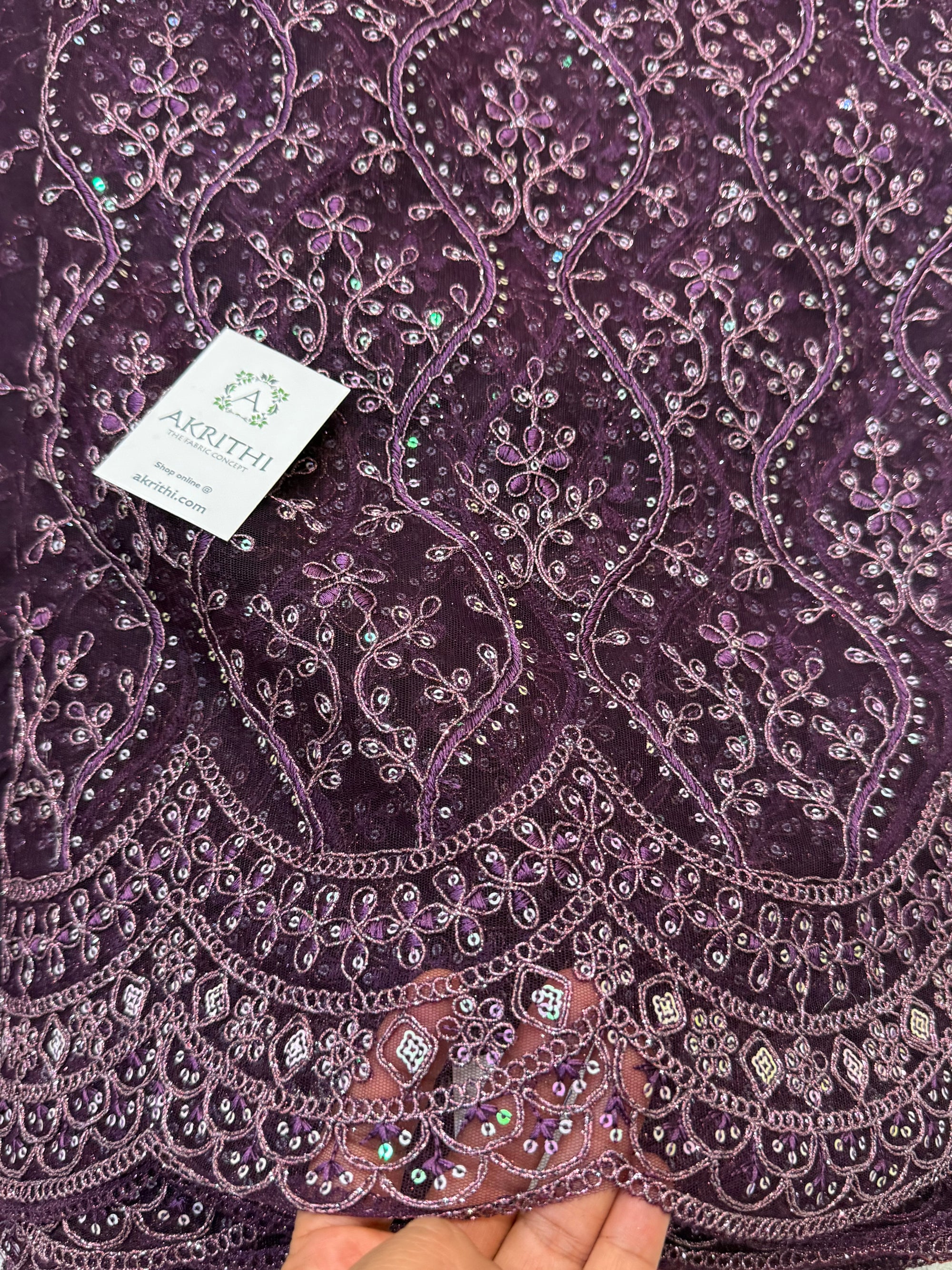 Embroidered net fabric