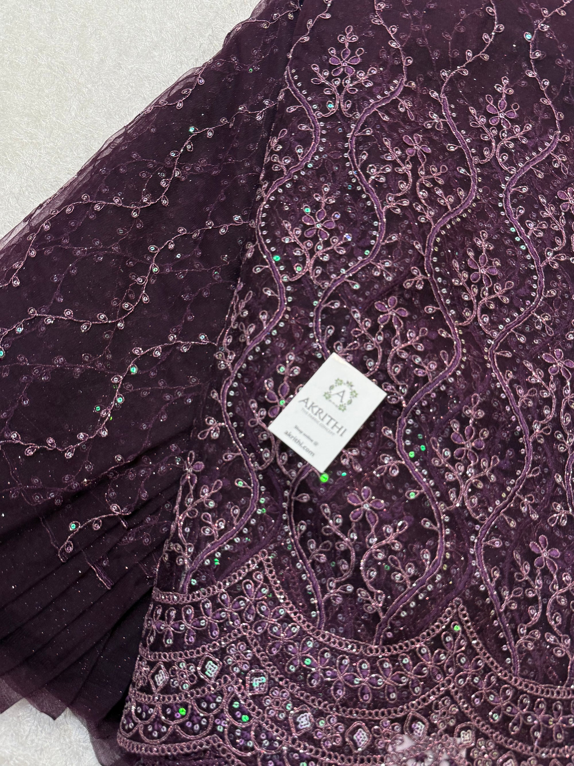 Embroidered net fabric