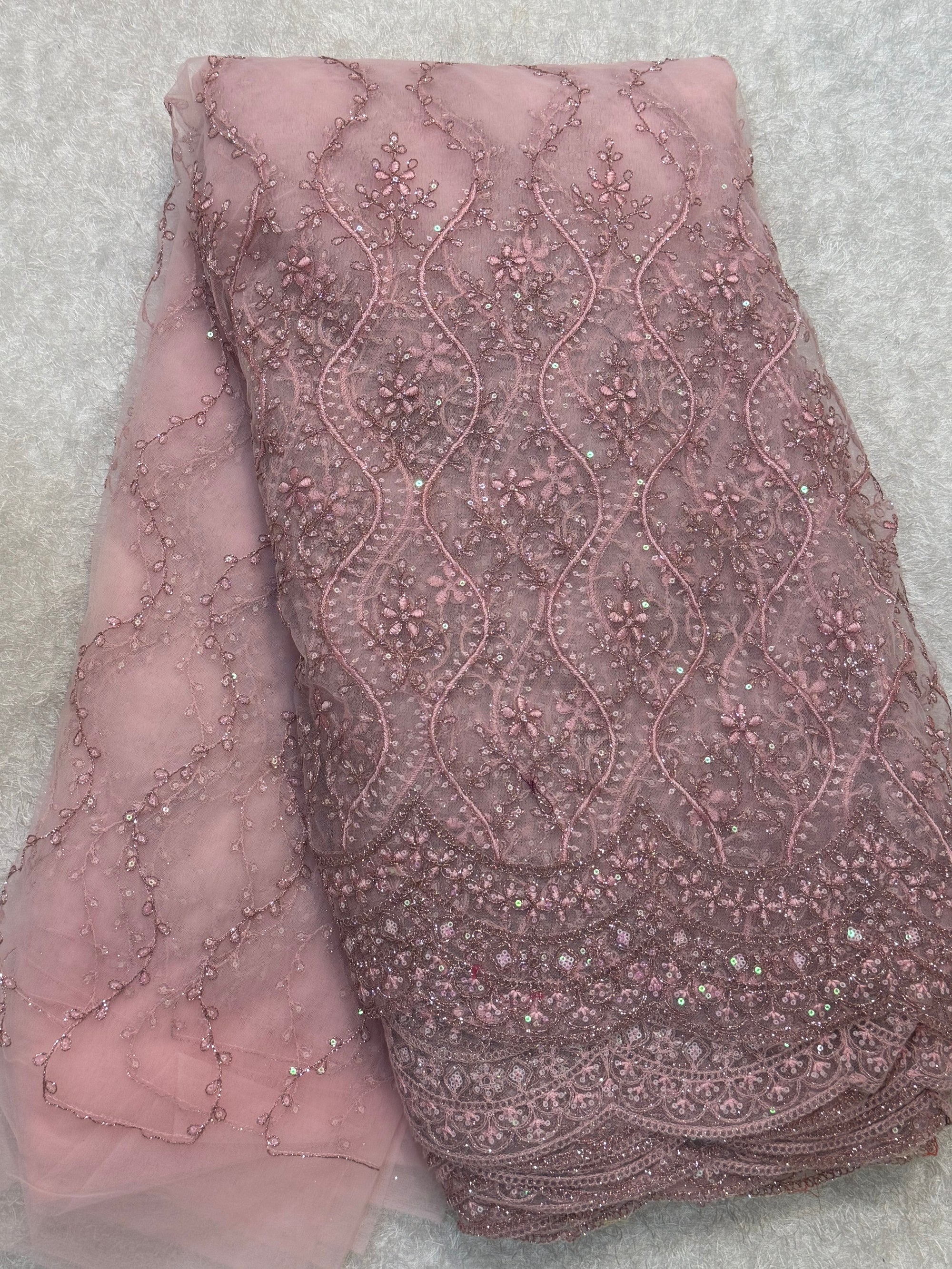 Embroidered net fabric