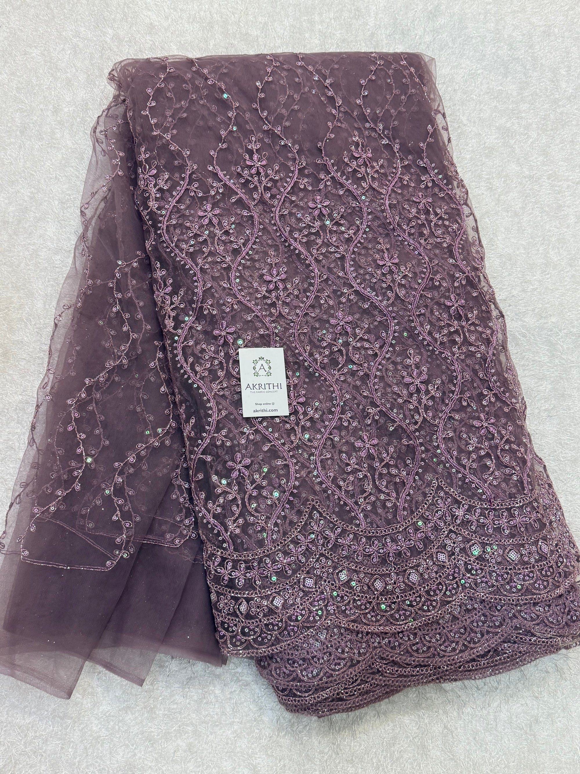 Embroidered net fabric