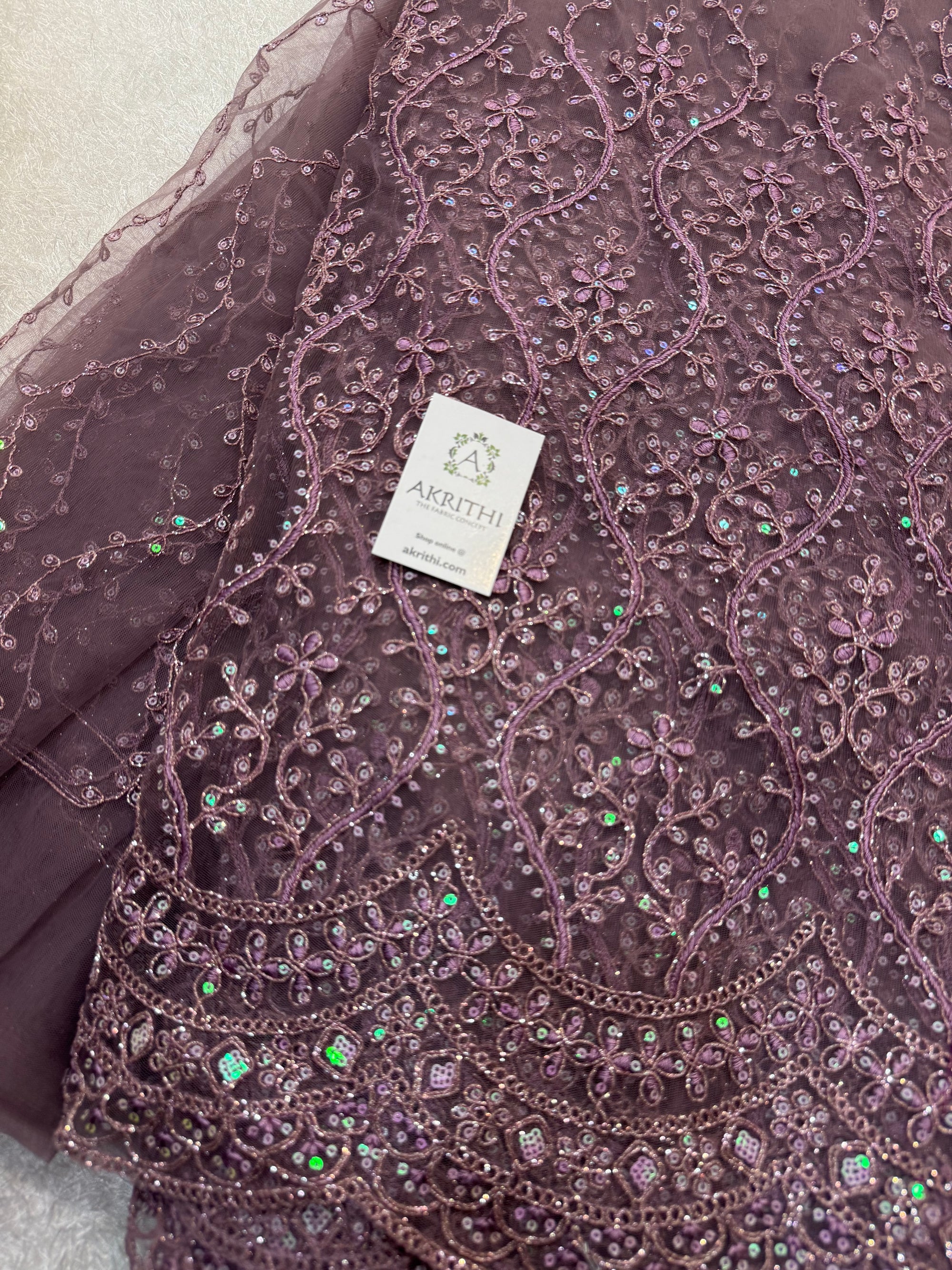 Embroidered net fabric