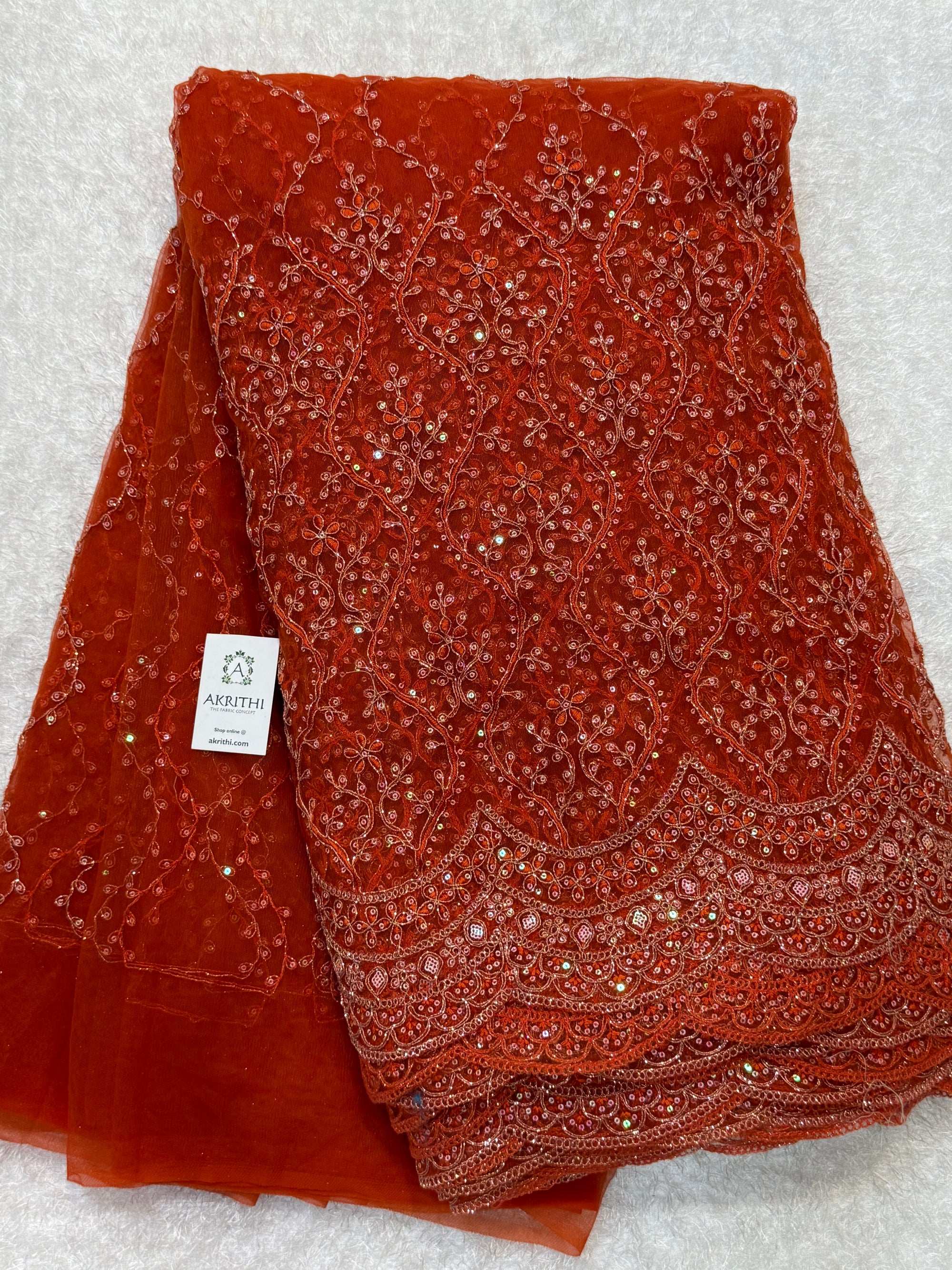 Embroidered net fabric