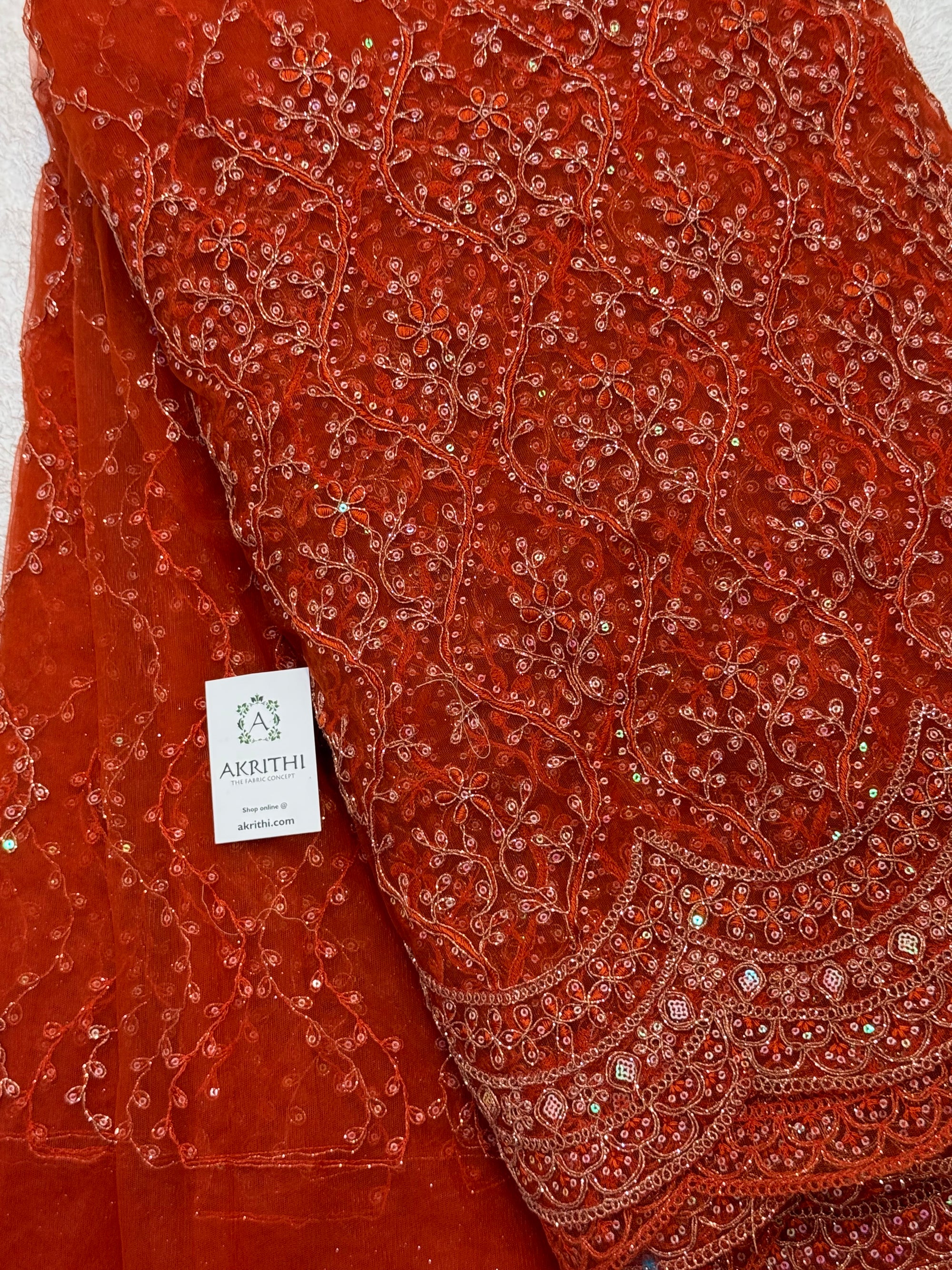 Embroidered net fabric